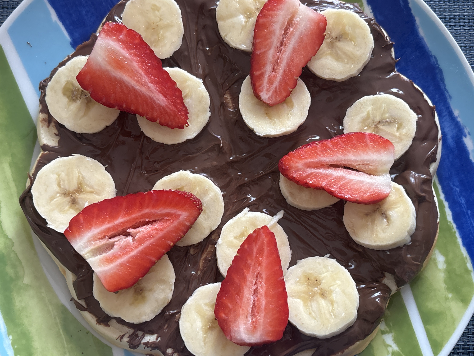 Banana chocolate dessert pizza documented in Sofia