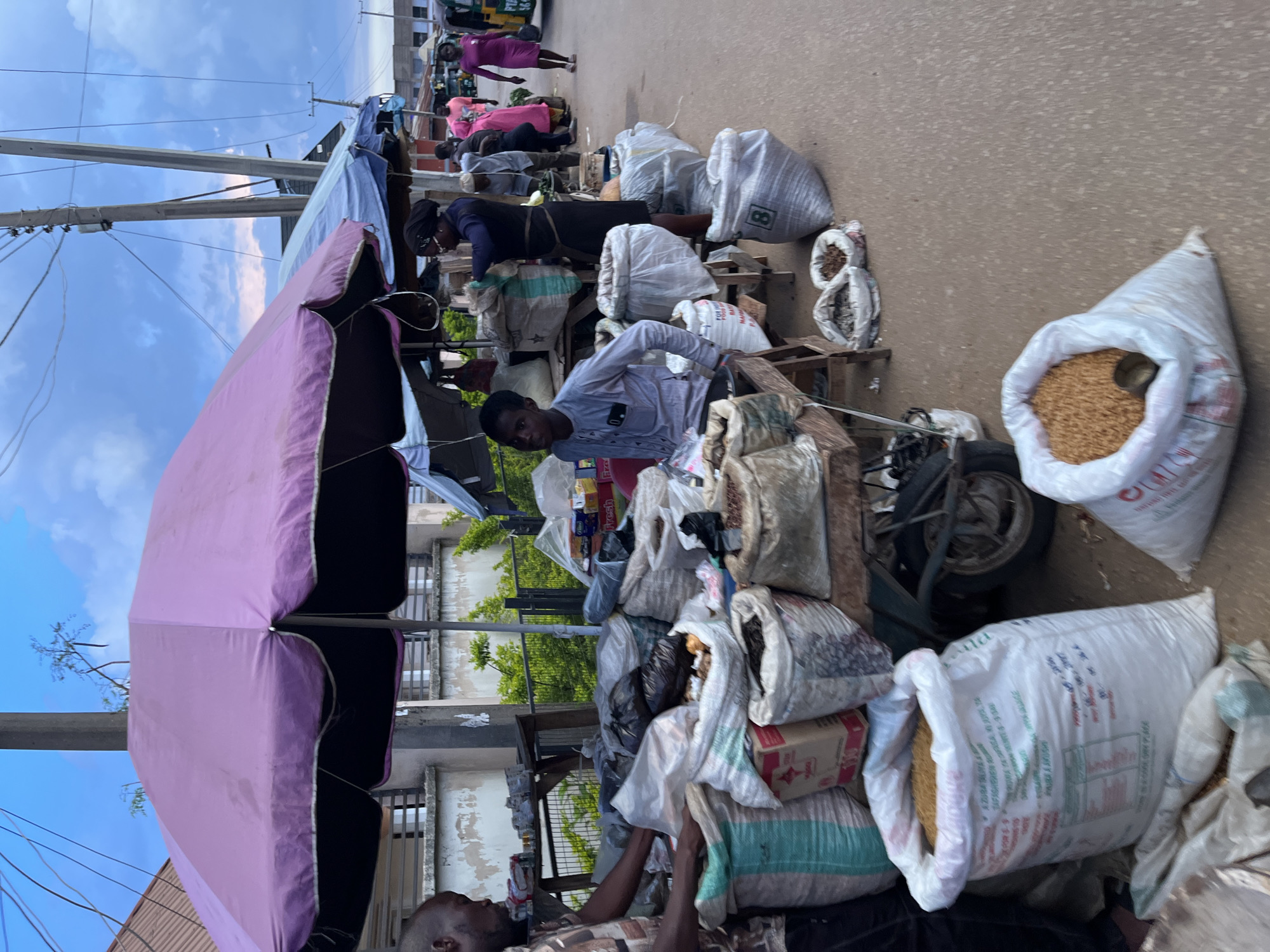 Street Market Bustles With Vendors and Shoppers