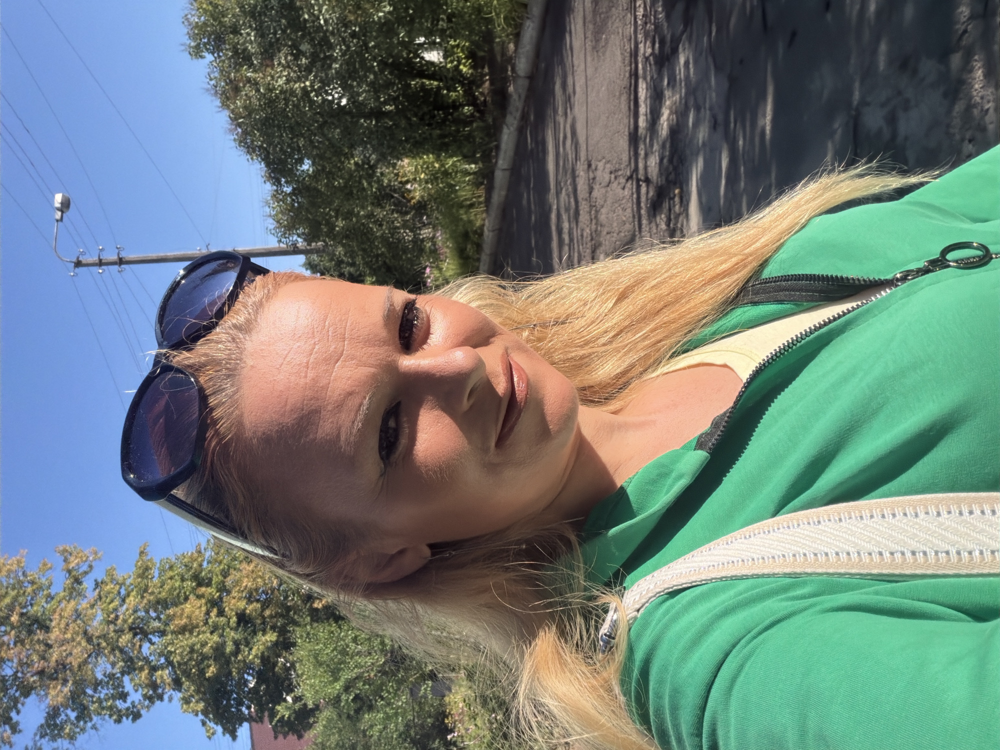 Outdoor selfies, a foraging bird, and a yellow flower