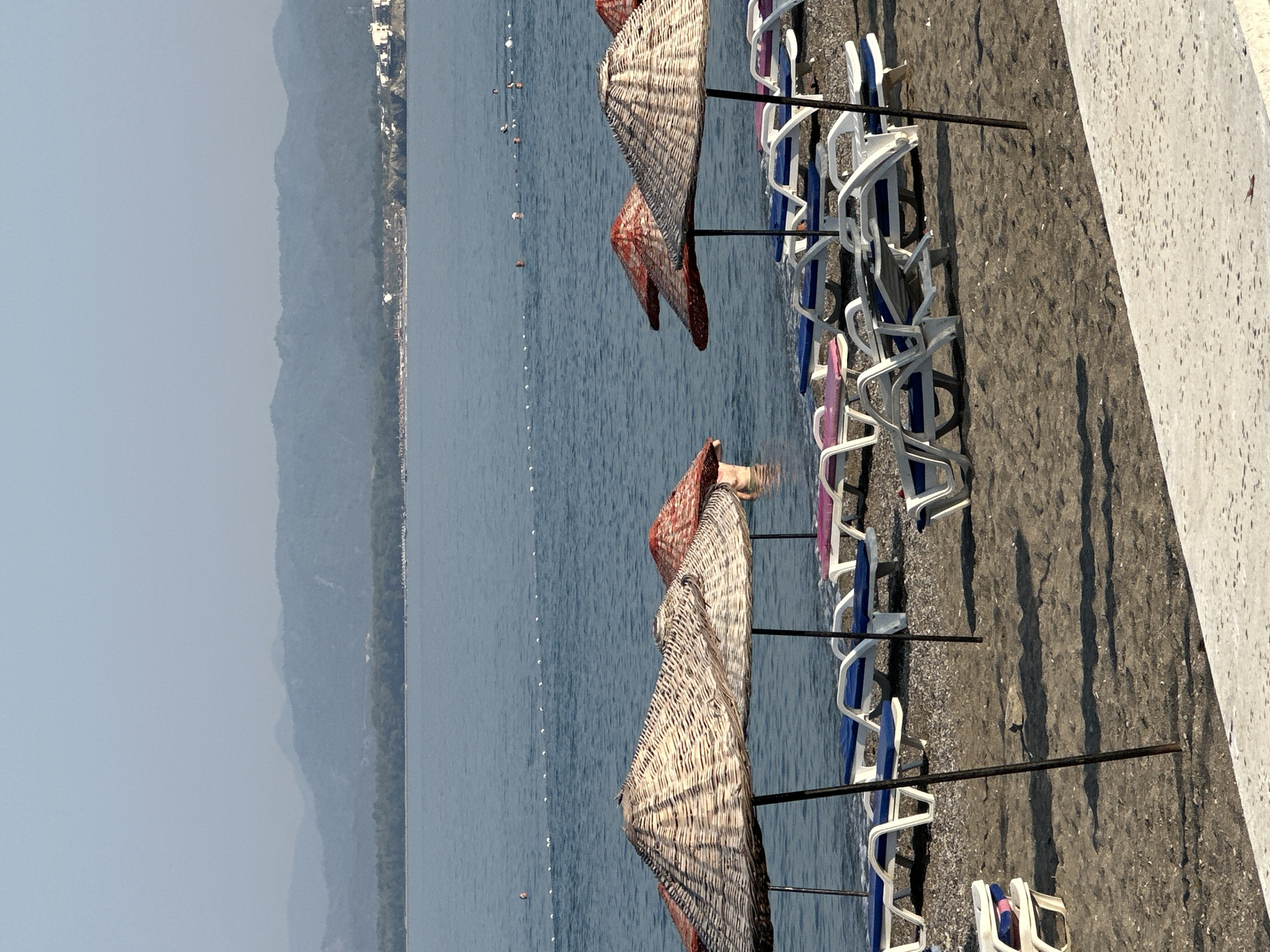 Empty beach chairs on a calm Fethiye morning