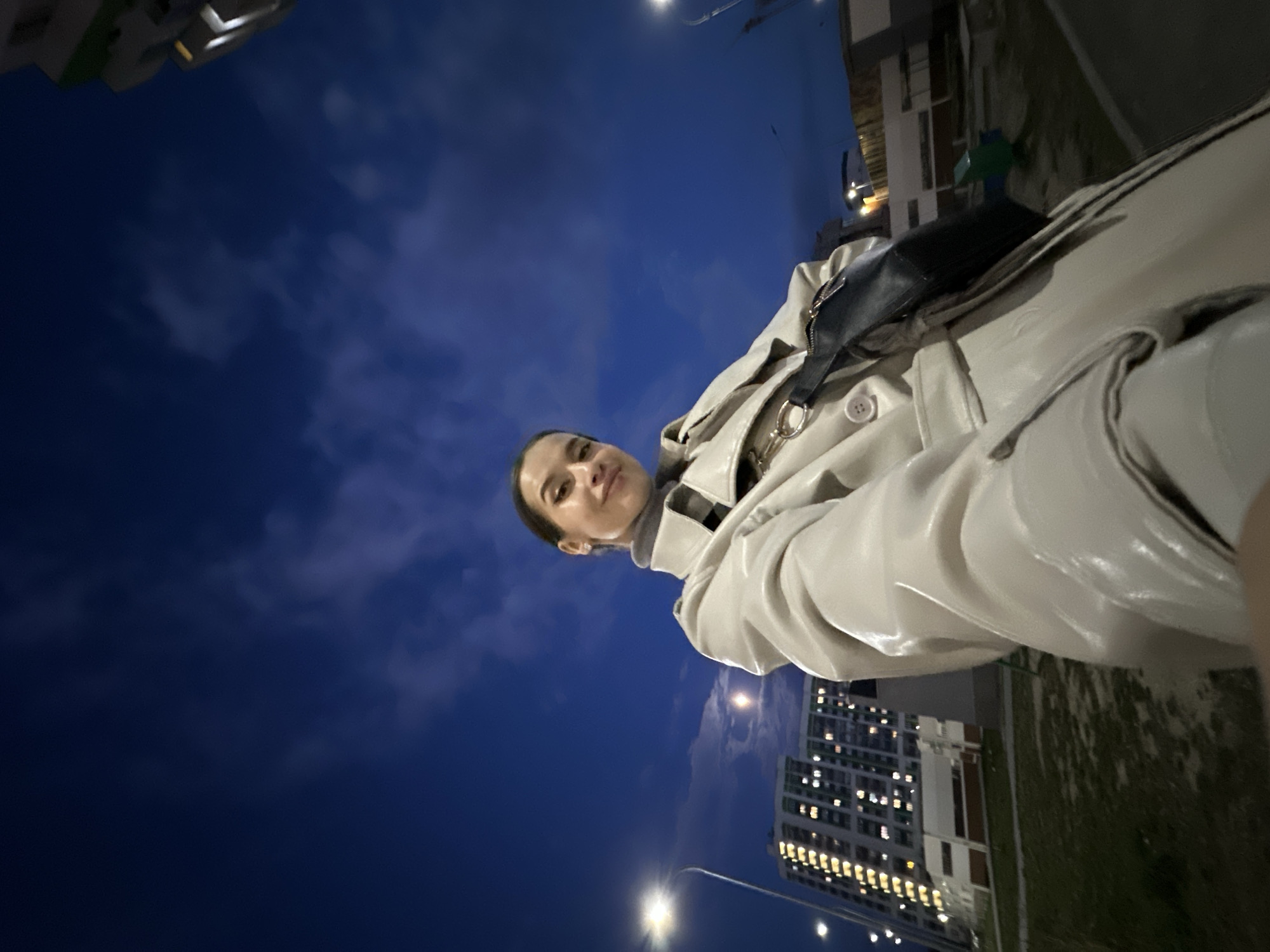 Witness captures nighttime moon and cityscape views in Yekaterinburg