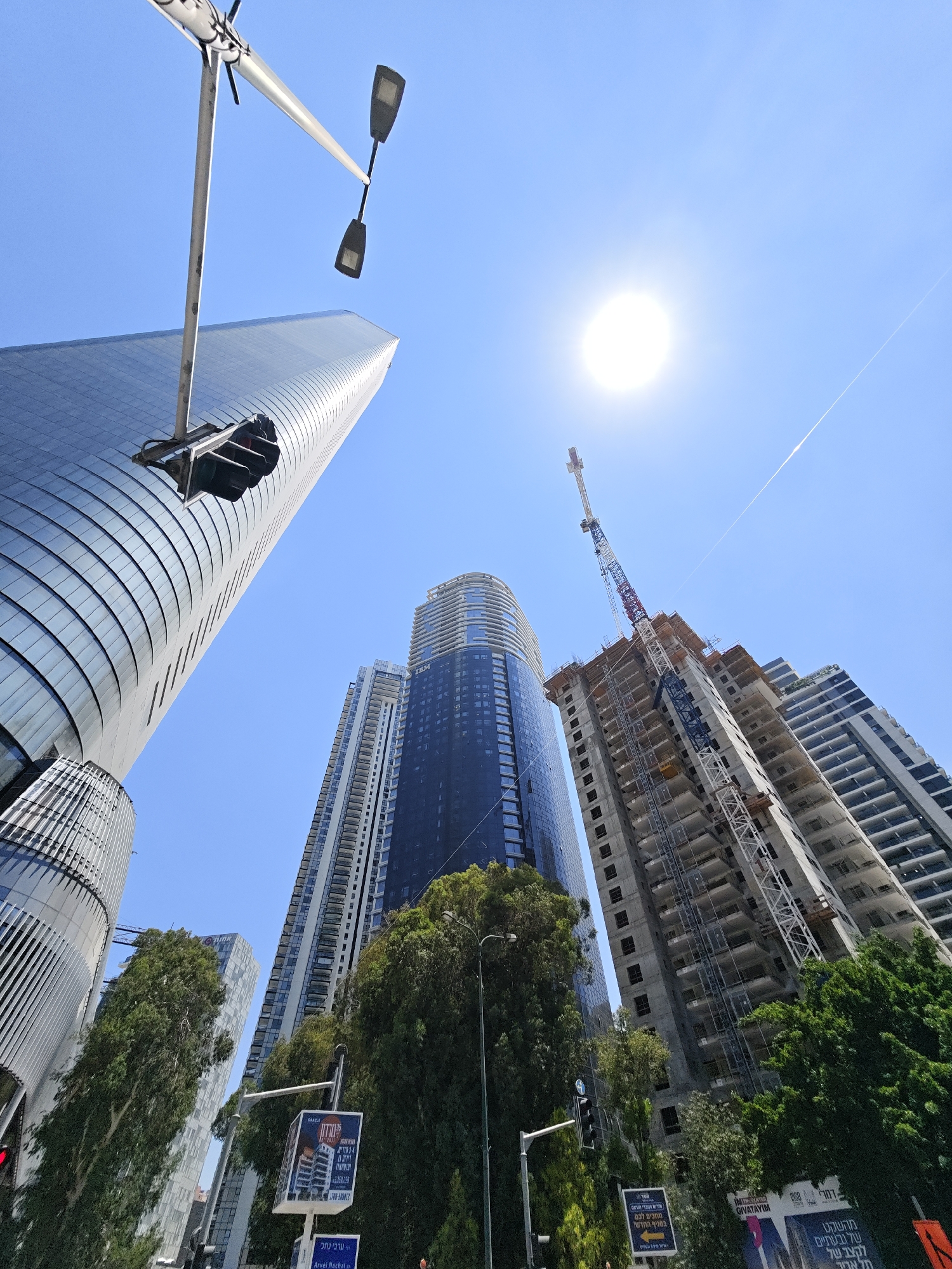 Tel Aviv construction boom under a clear summer sky
