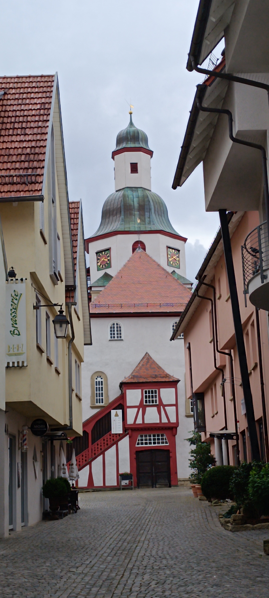Stormy afternoon drifting through Winnenden's old town streets and rooftops