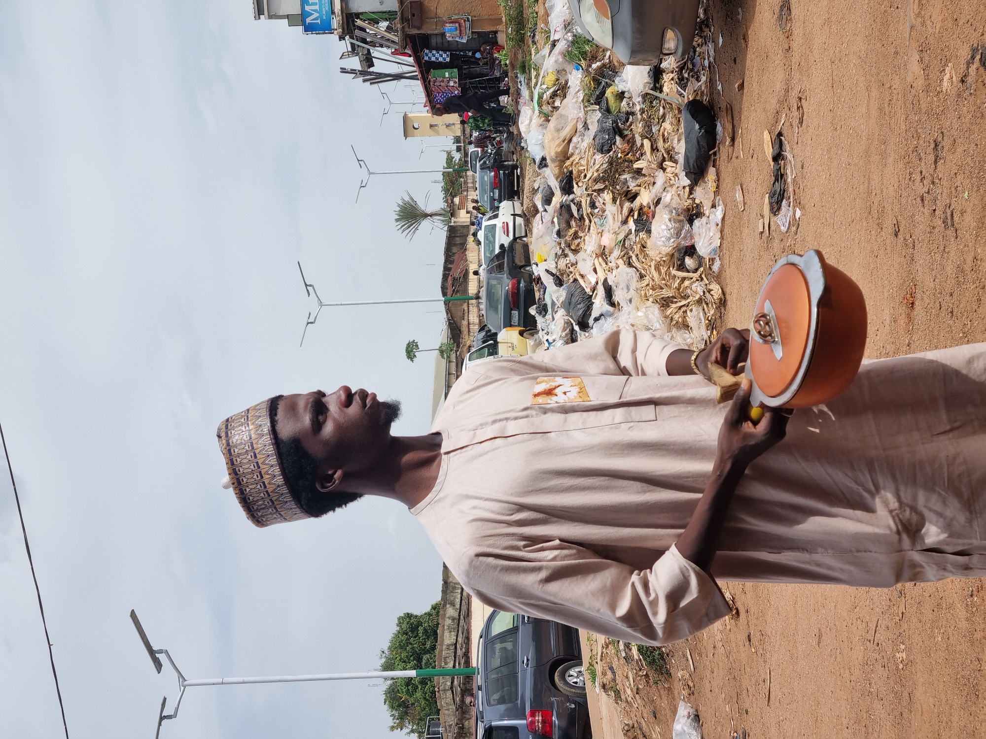 Daily life unfolds across Jos, Nigeria streets and markets