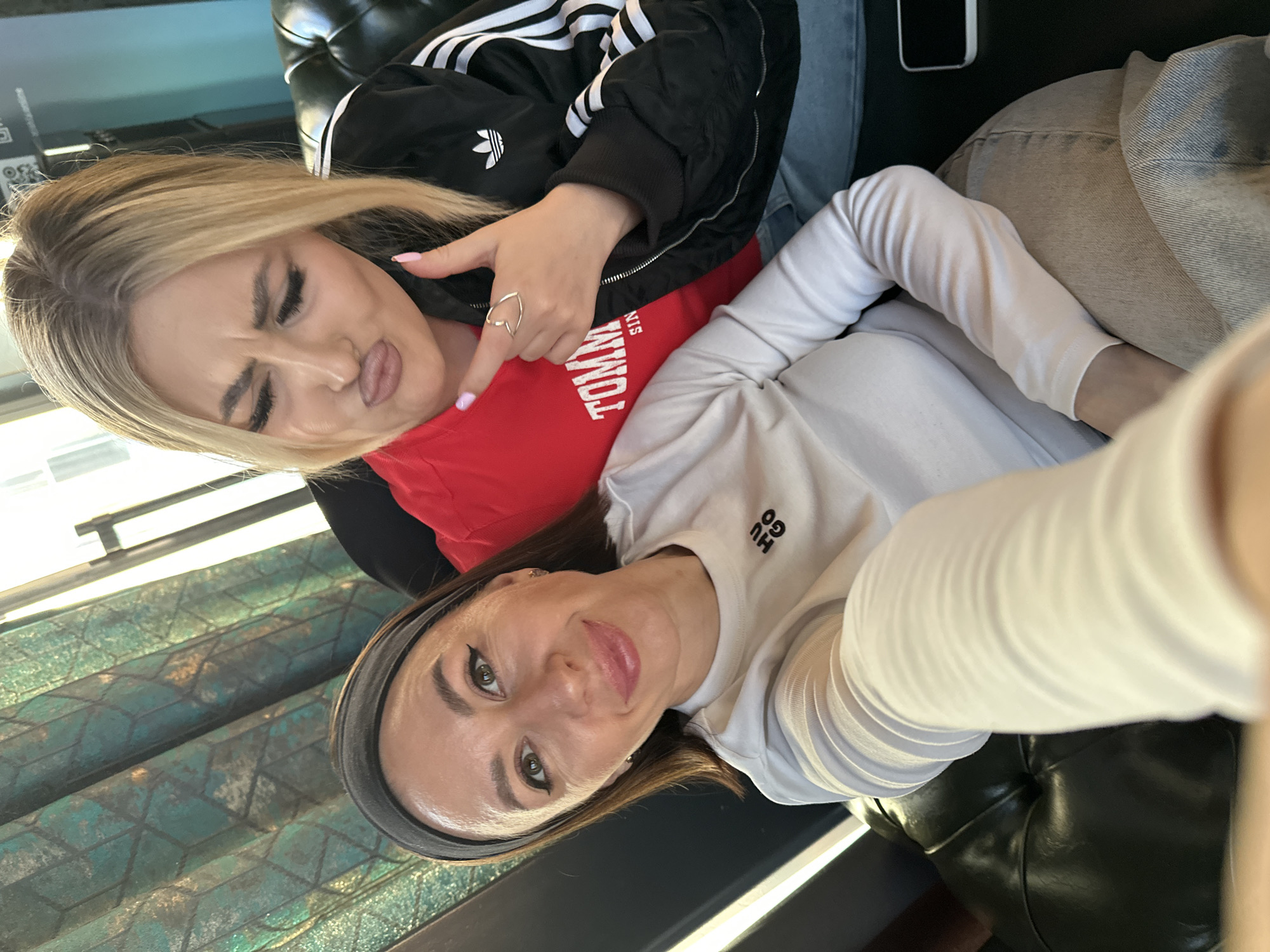 Two women dine and take selfies at Votkinsk restaurant