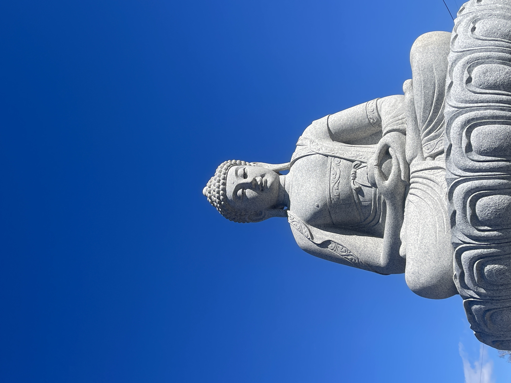 Buddha statue photographed overlooking Krasnoyarsk, Russia