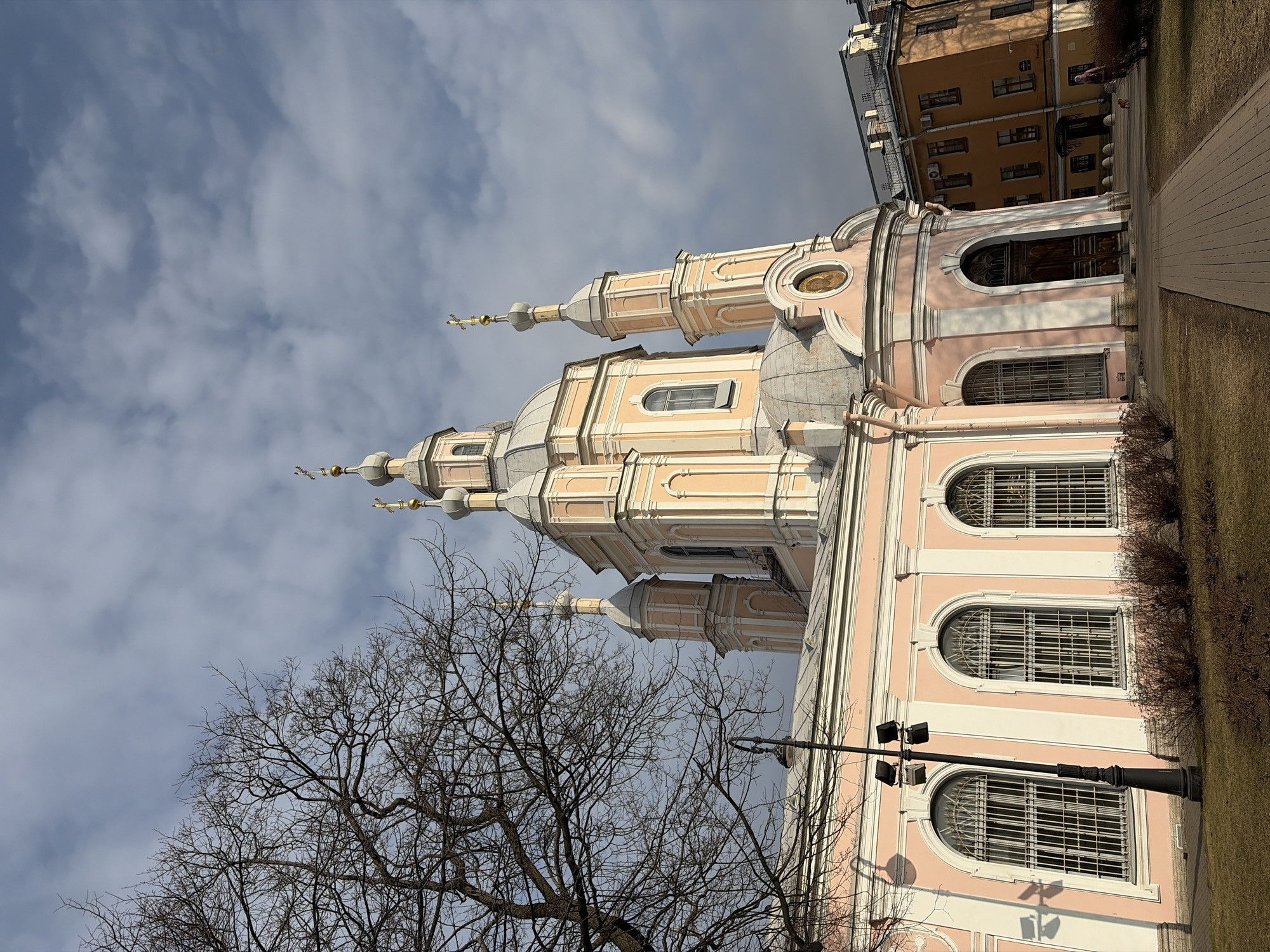 Tourist documents Smolny Cathedral visit in early spring Saint Petersburg