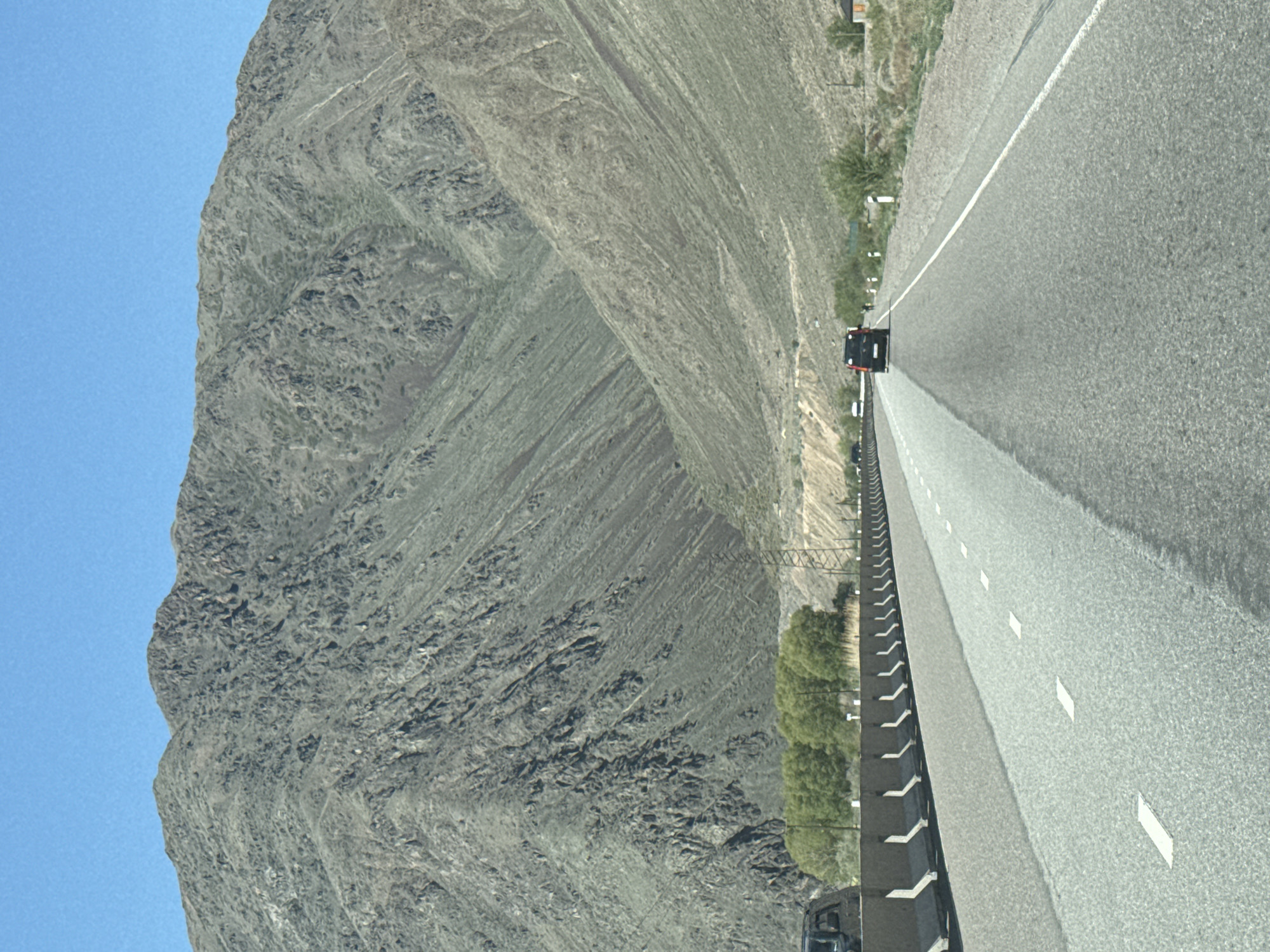 Vehicle captures highway view in Kyrgyzstan