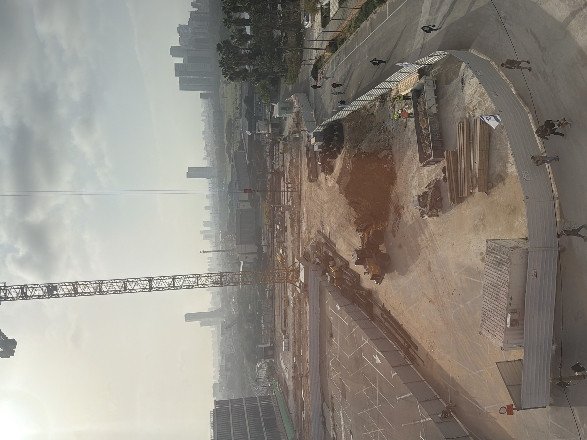 Construction crane operates at Tel-Aviv building site