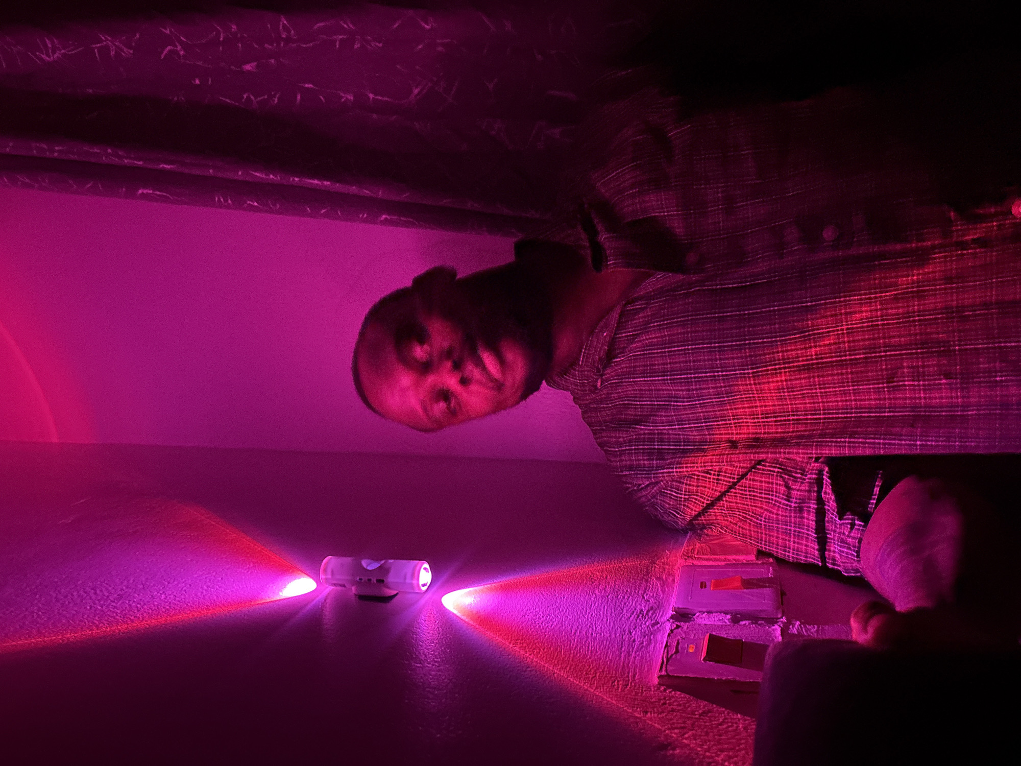 Nigeria residents experiment with colored lighting devices in evening session
