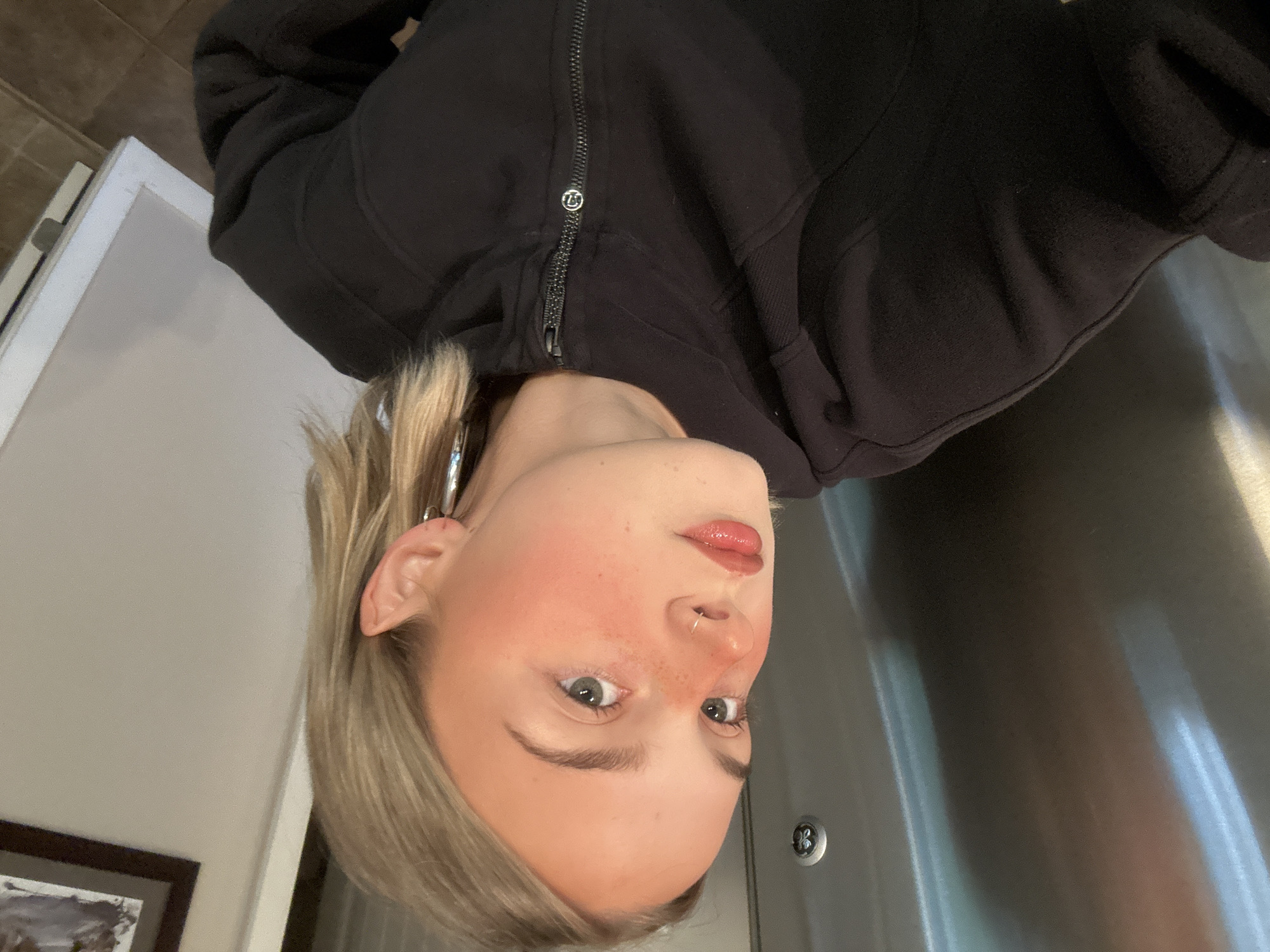 Person takes selfie indoors in Whistler, Canada