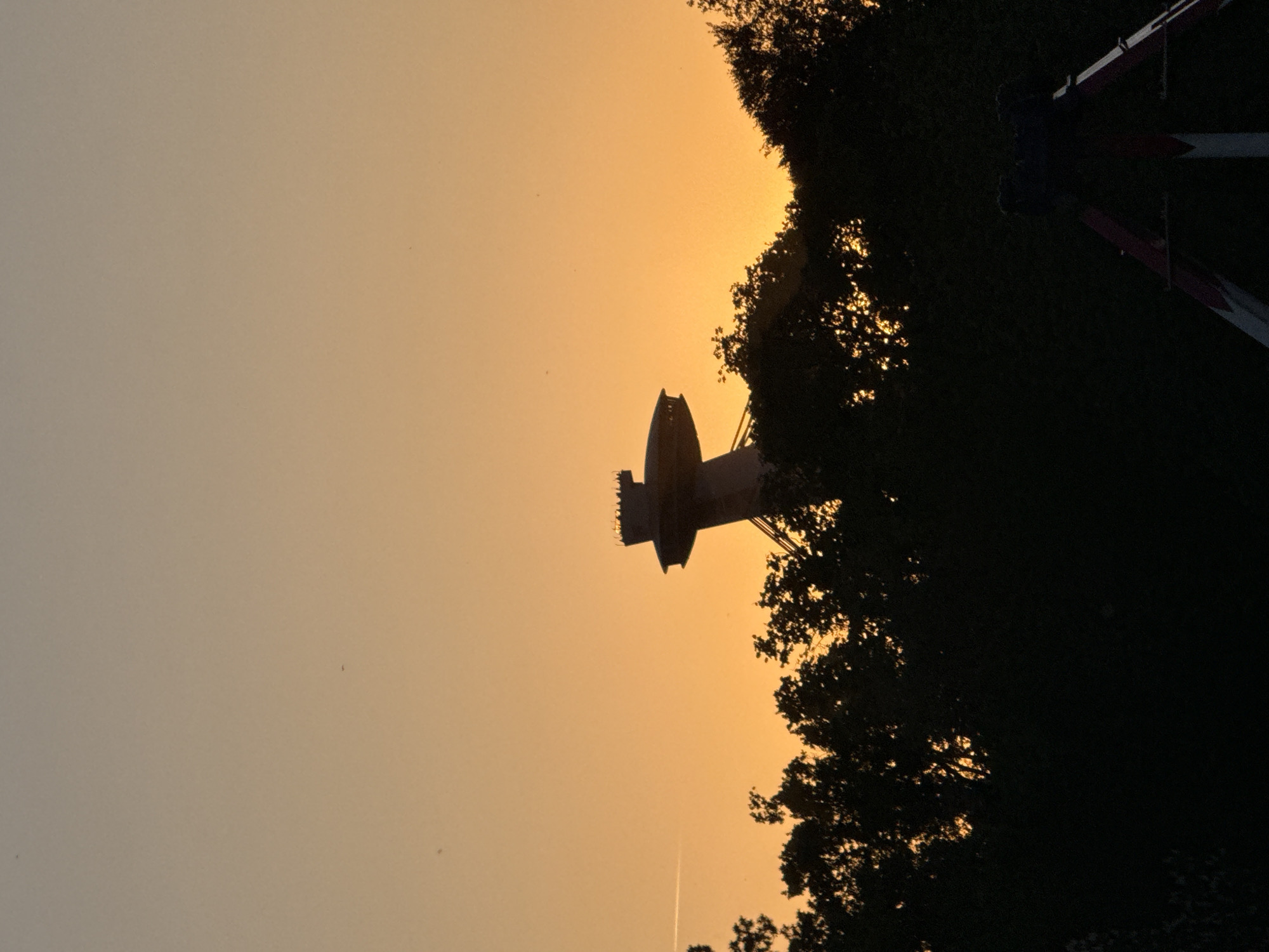 Crowd gathers for outdoor event in Bratislava at sunset