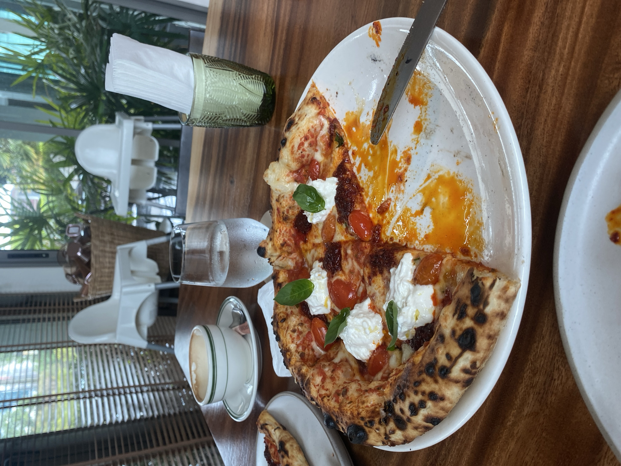 Morning pizza meal documented during rainy weather in Choeng Thale