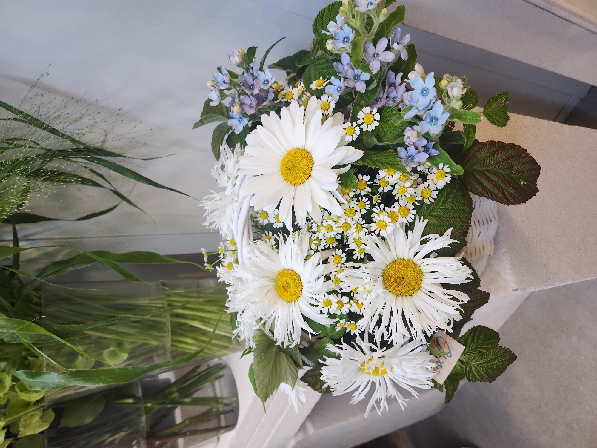 Moscow flower shop displays a spread of fresh summer bouquets