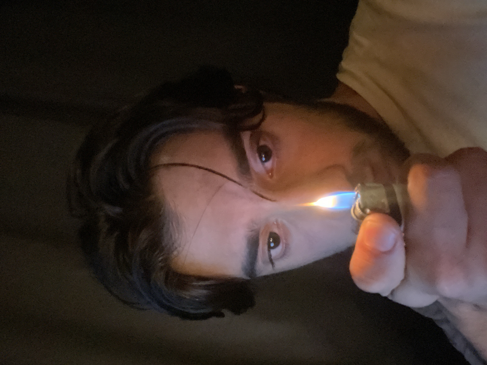 Casual home hangout with gaming, selfies, and random objects