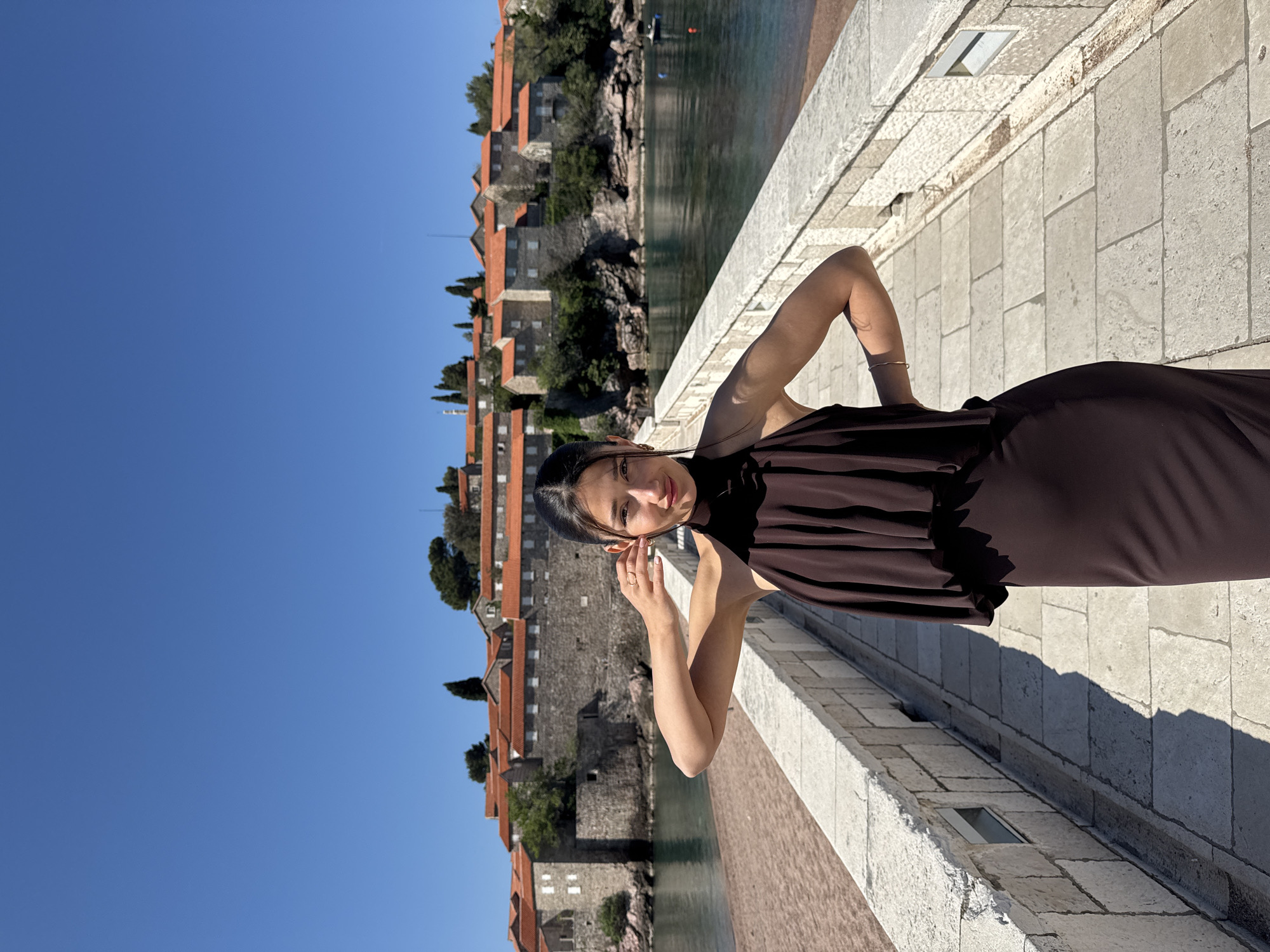 Morning tourist activity observed at Sveti Stefan, Montenegro