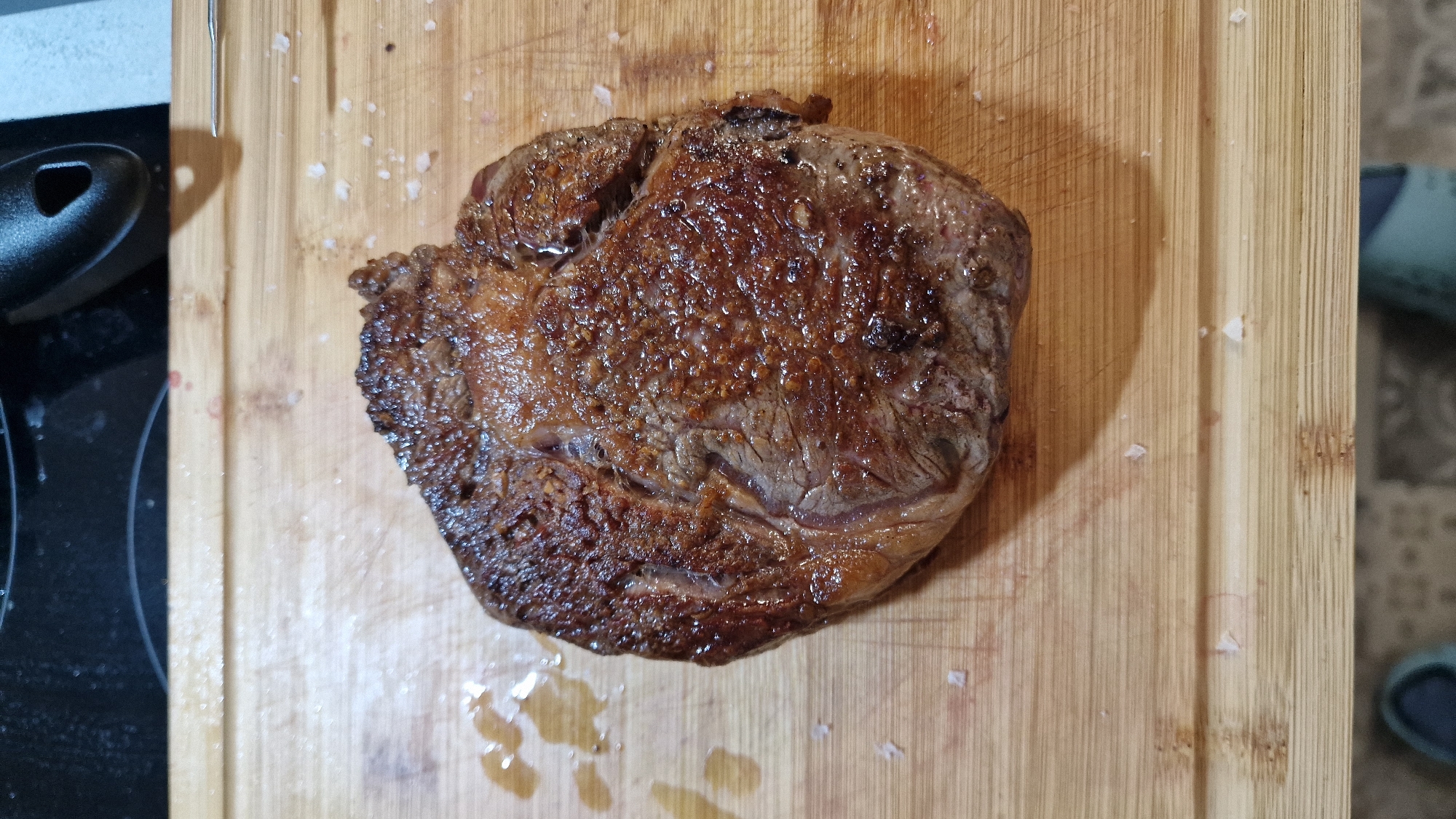 Medium-rare steak served on cutting board in Sofia