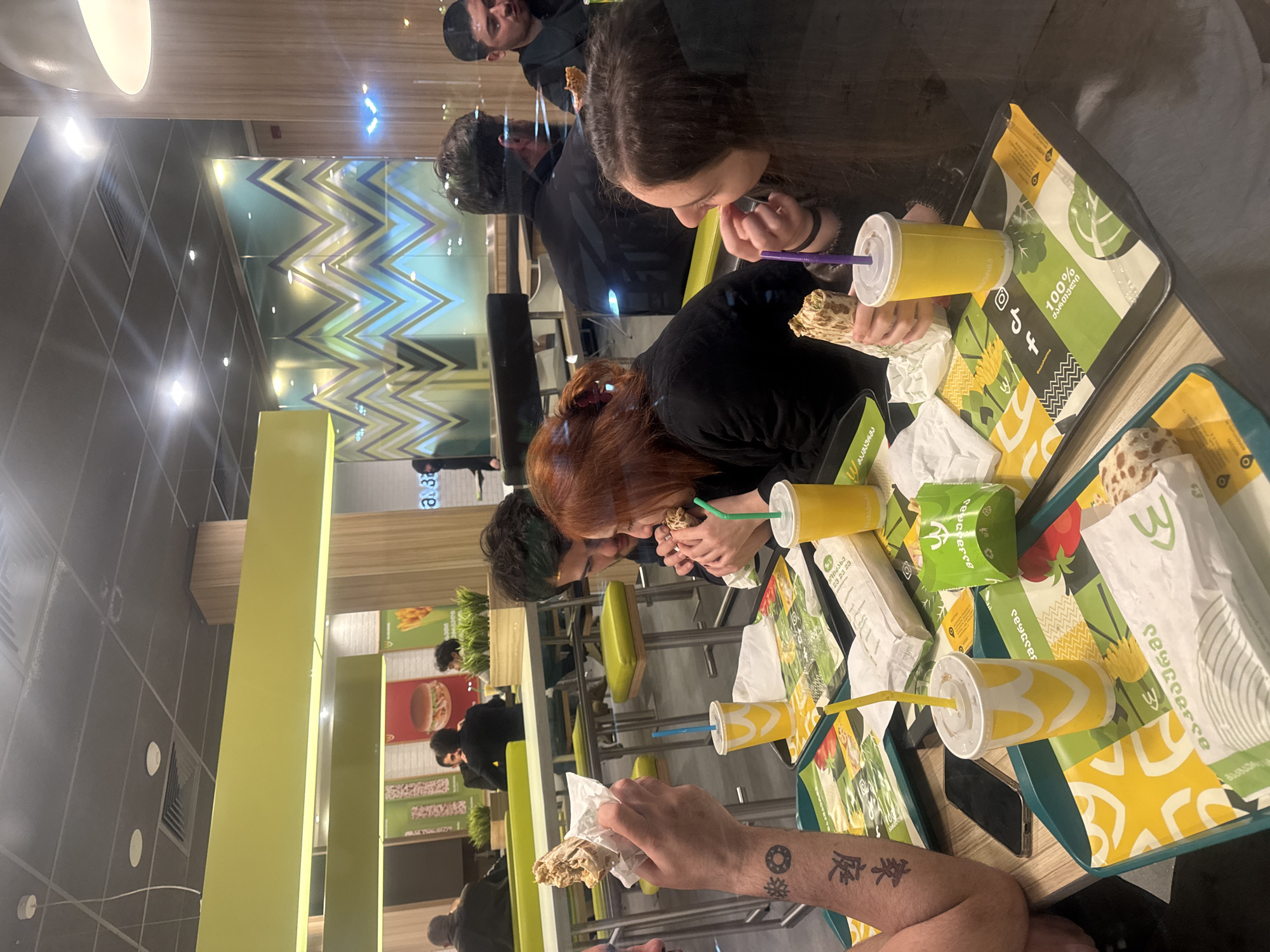 Evening McDonald's dinner gathering captured in Tbilisi, Georgia