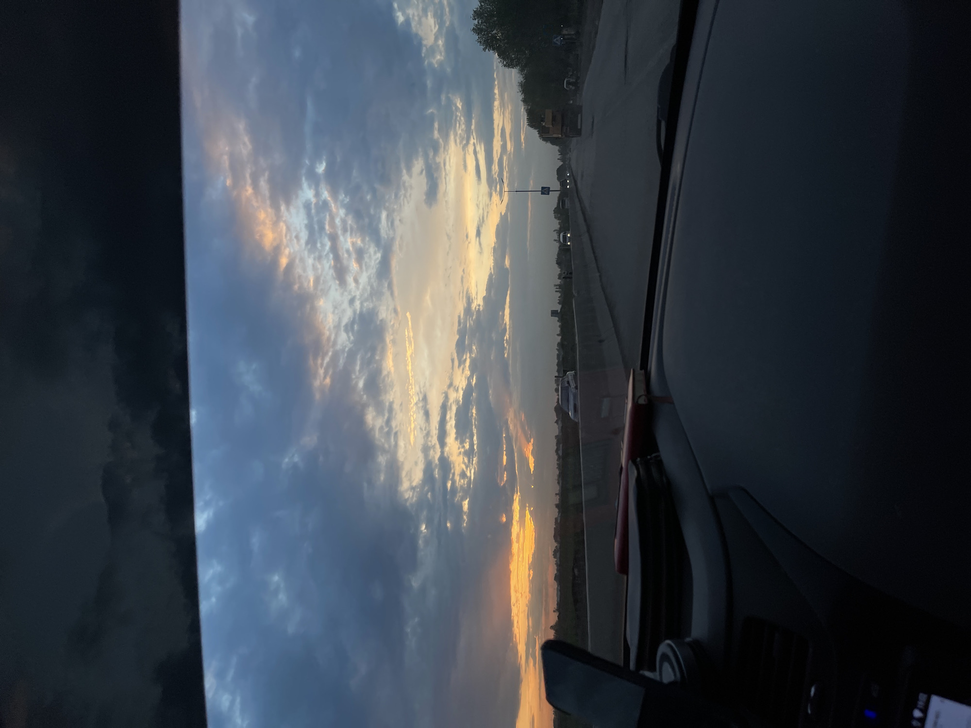 Sunset viewed from vehicle windshield in Sanchikul, Uzbekistan