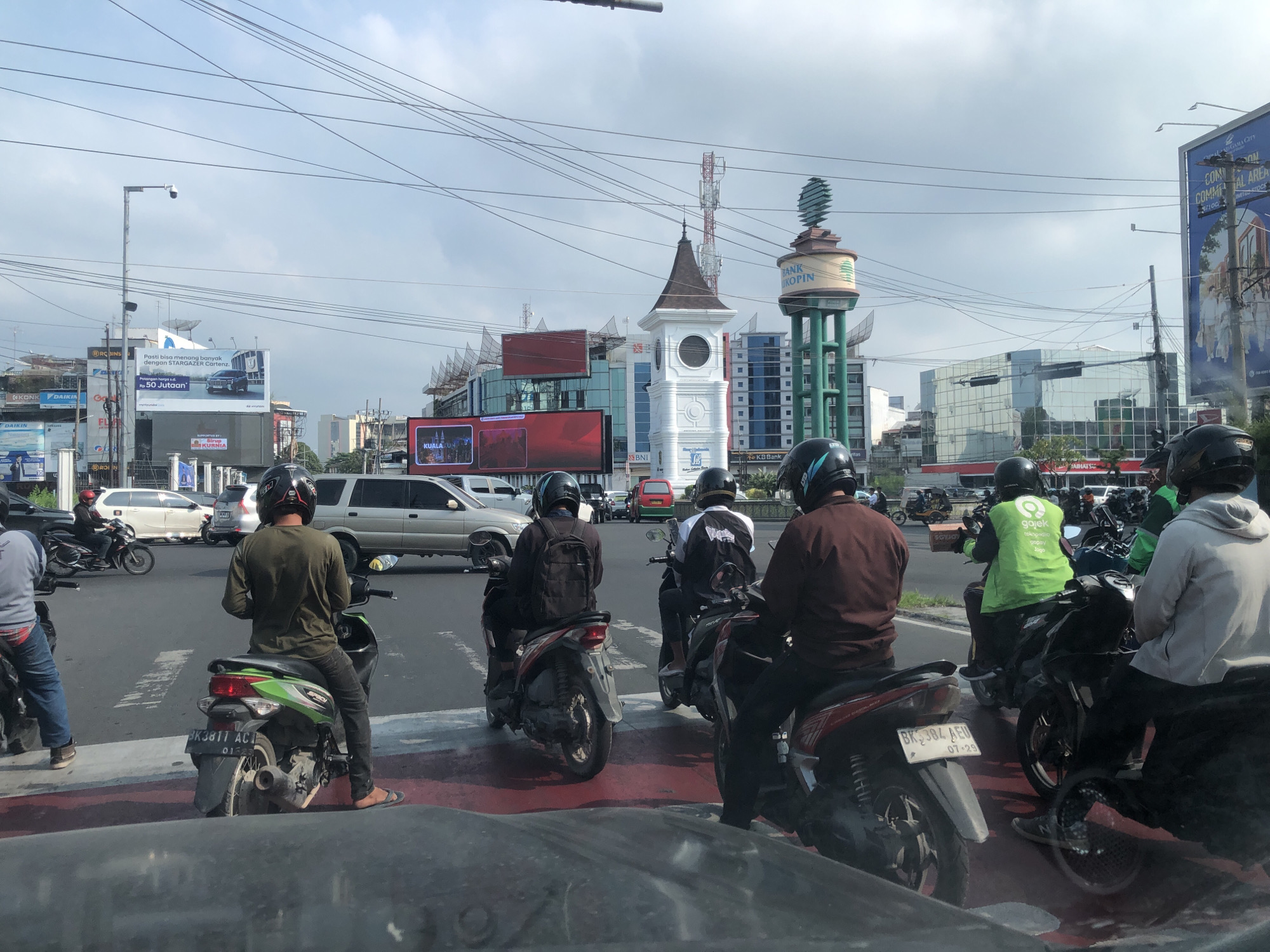 Morning traffic at a Medan city intersection