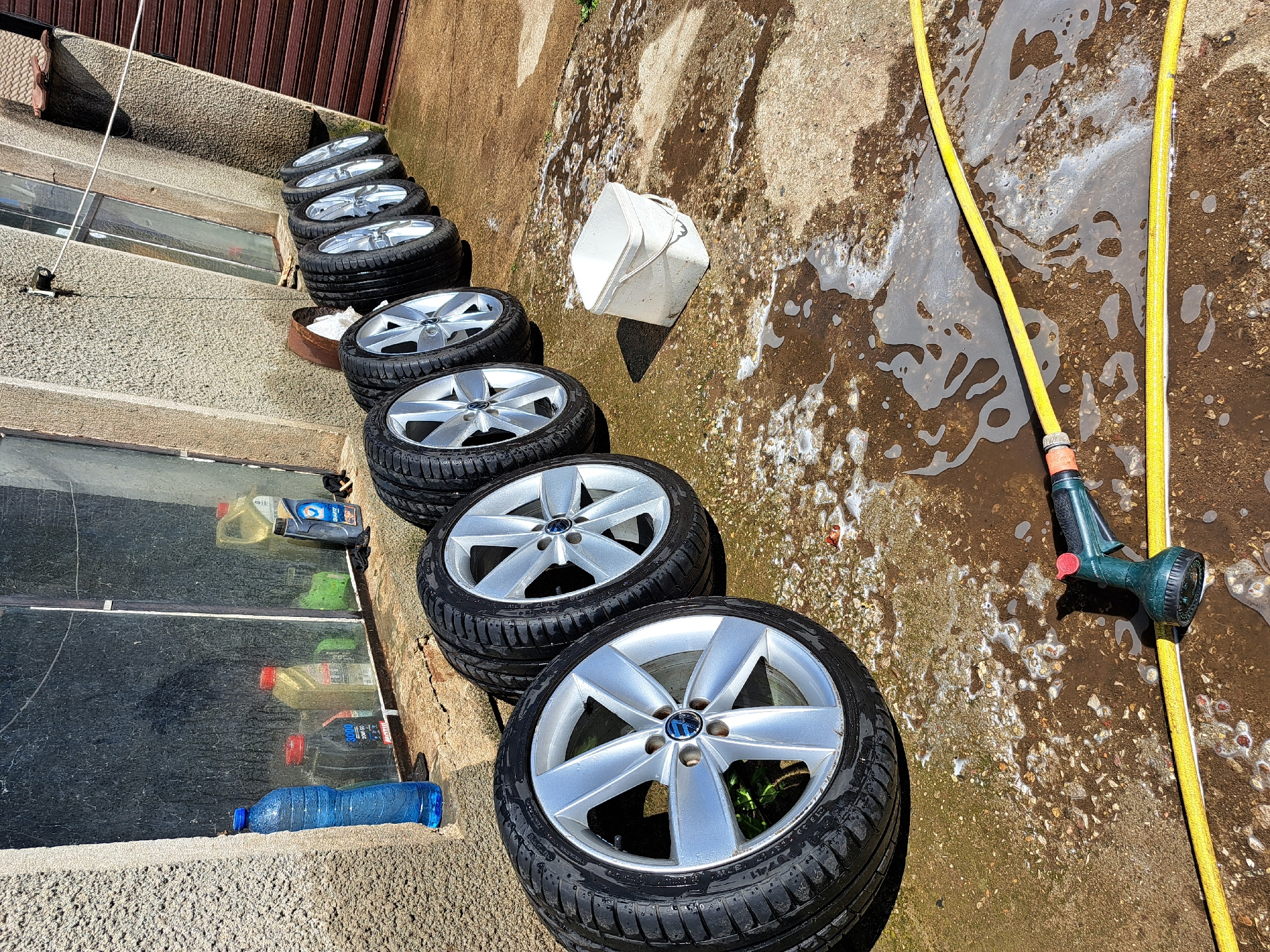 Used car tires displayed on concrete in Chepintsi, Bulgaria