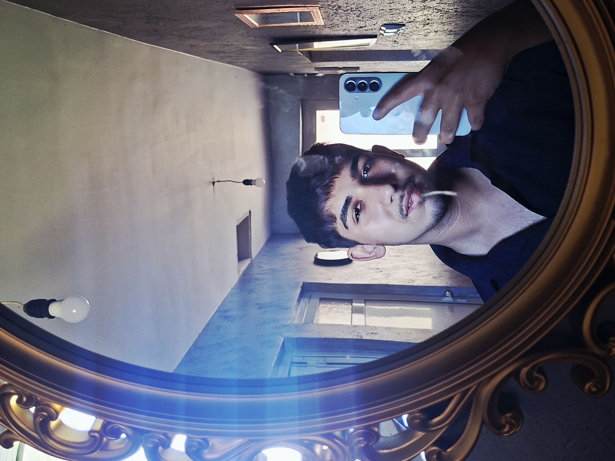 Person takes mirror selfie with smartphone in Bulgaria