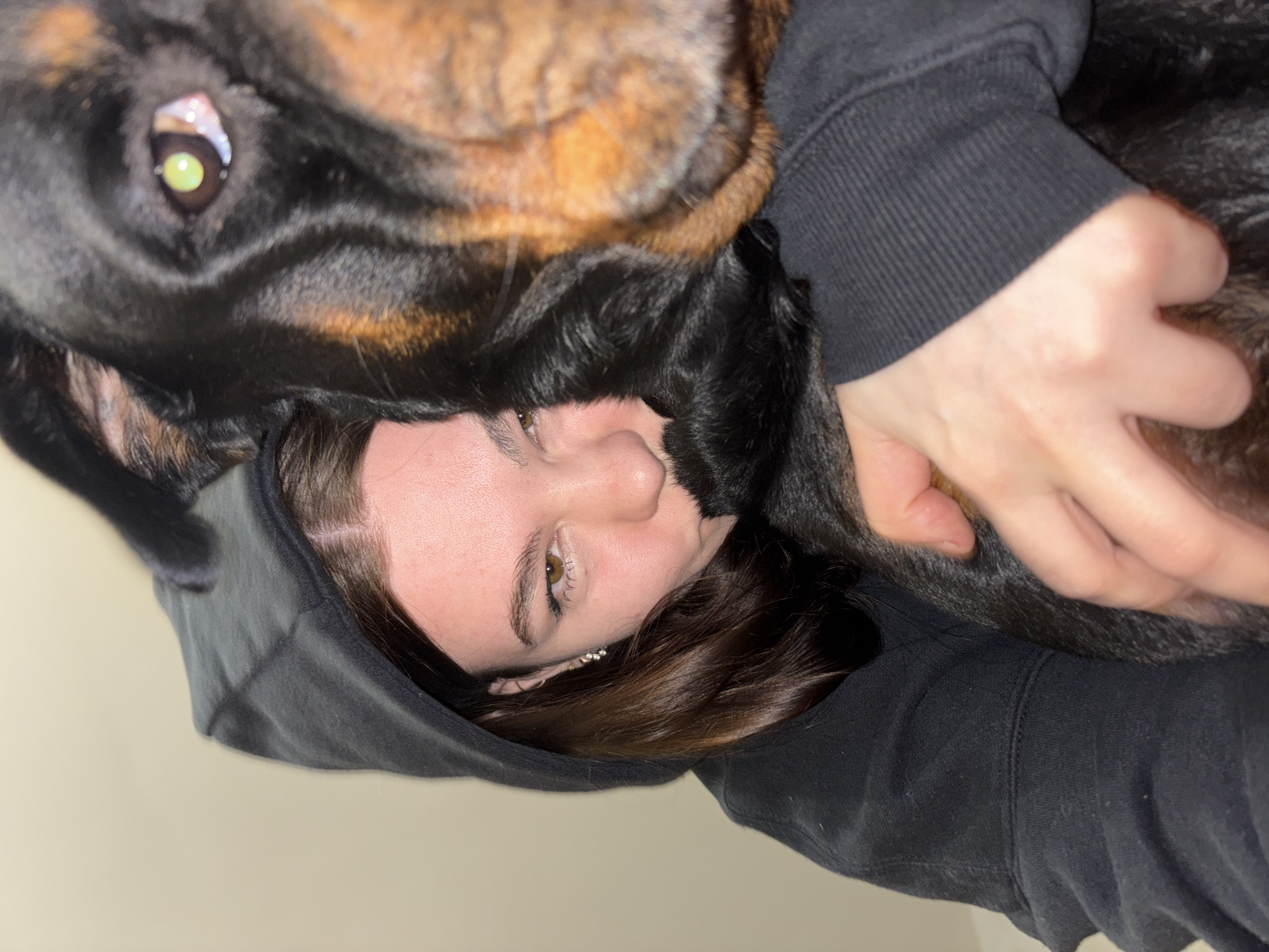 Person and large dog photographed together indoors in Perm