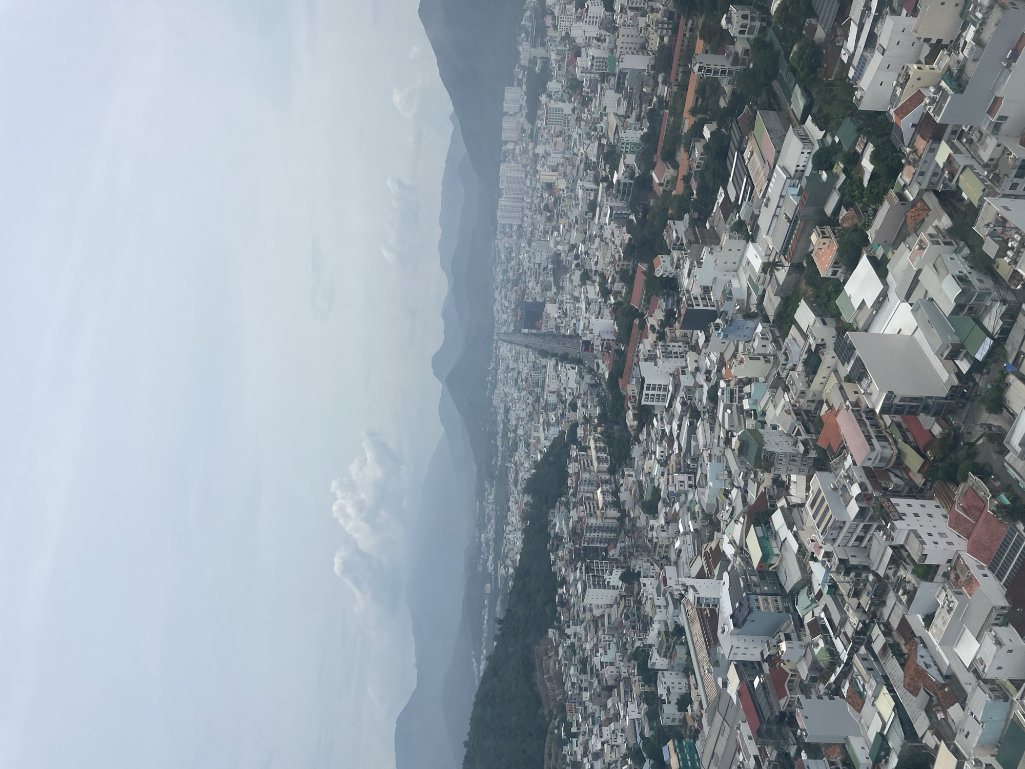 Snapshots of daily life across Nha Trang, from rooftops to street food