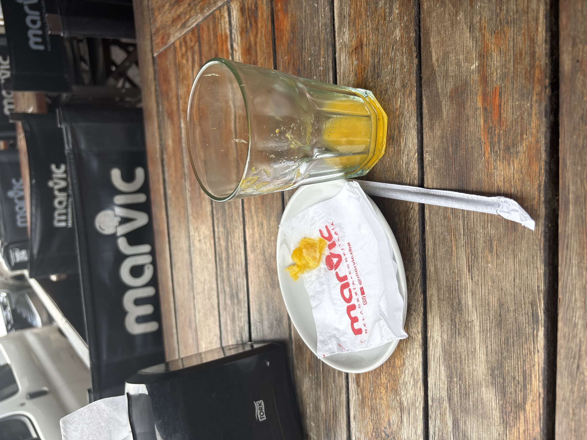 Meal remnants documented on outdoor table in Cordoba