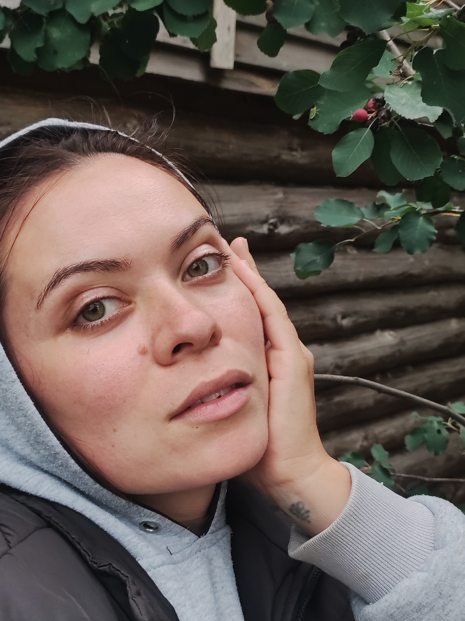 Portrait shoot among berry branches in the Russian countryside