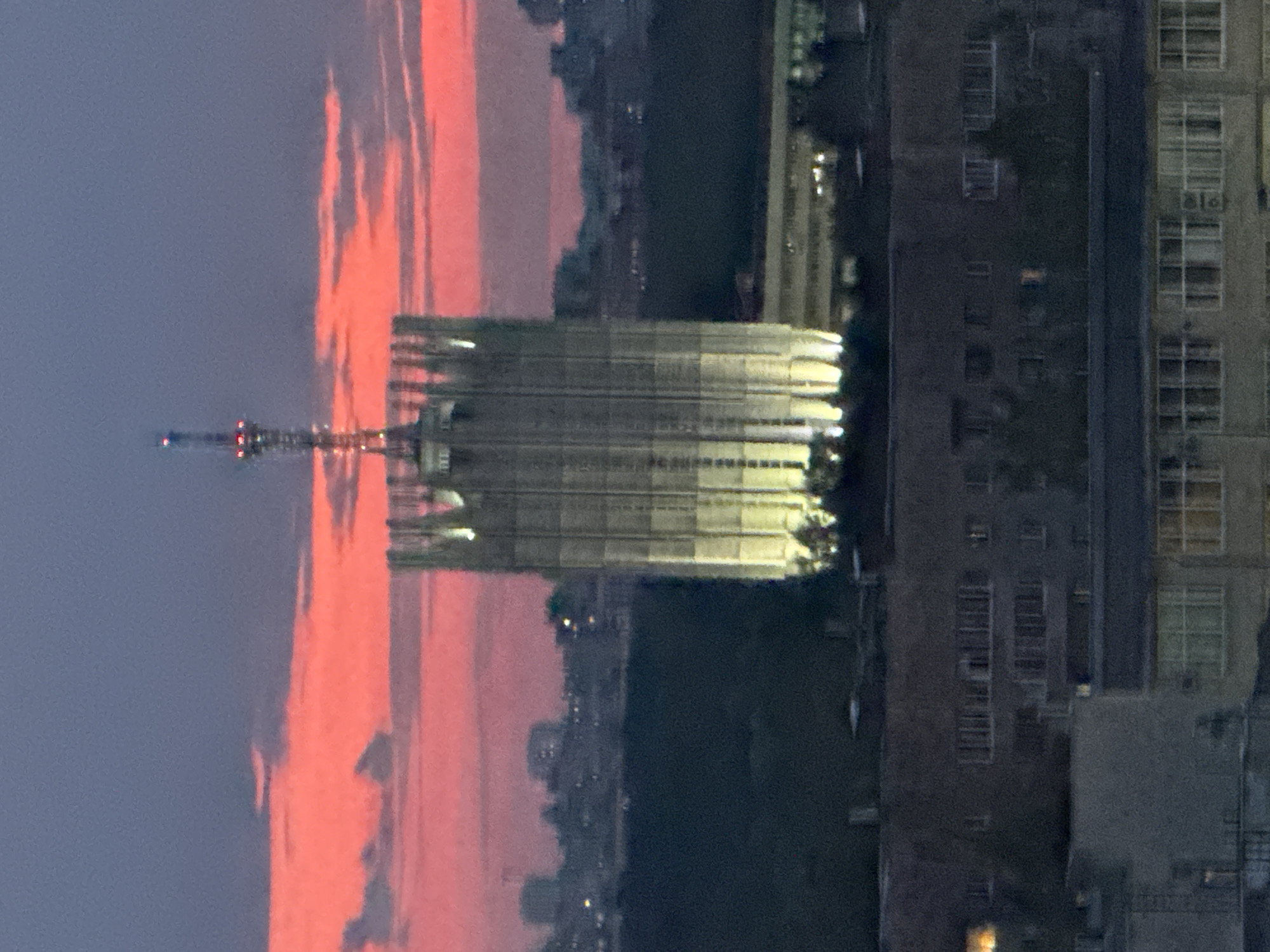 Twilight captures urban Sinyavino skyline with tower, residential buildings