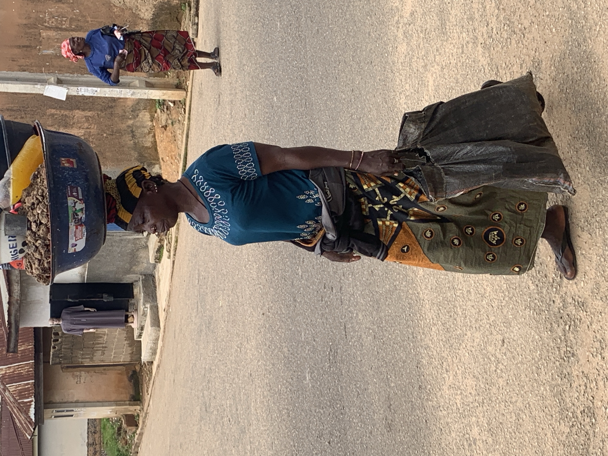 Foot traffic and daily life on a Jos street