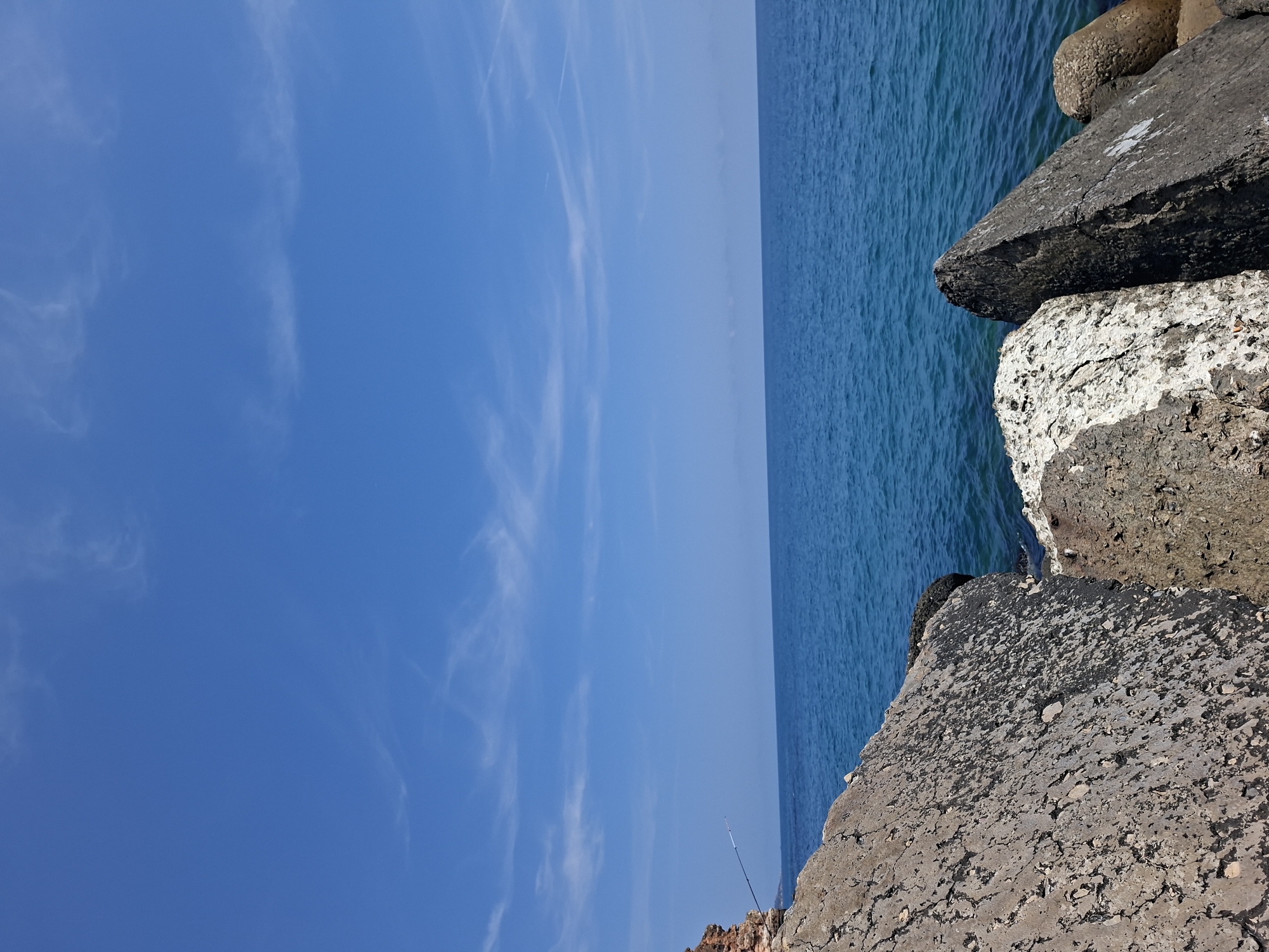 Black Sea coastline at Balgarevo: cliffs, beach, and old breakwater