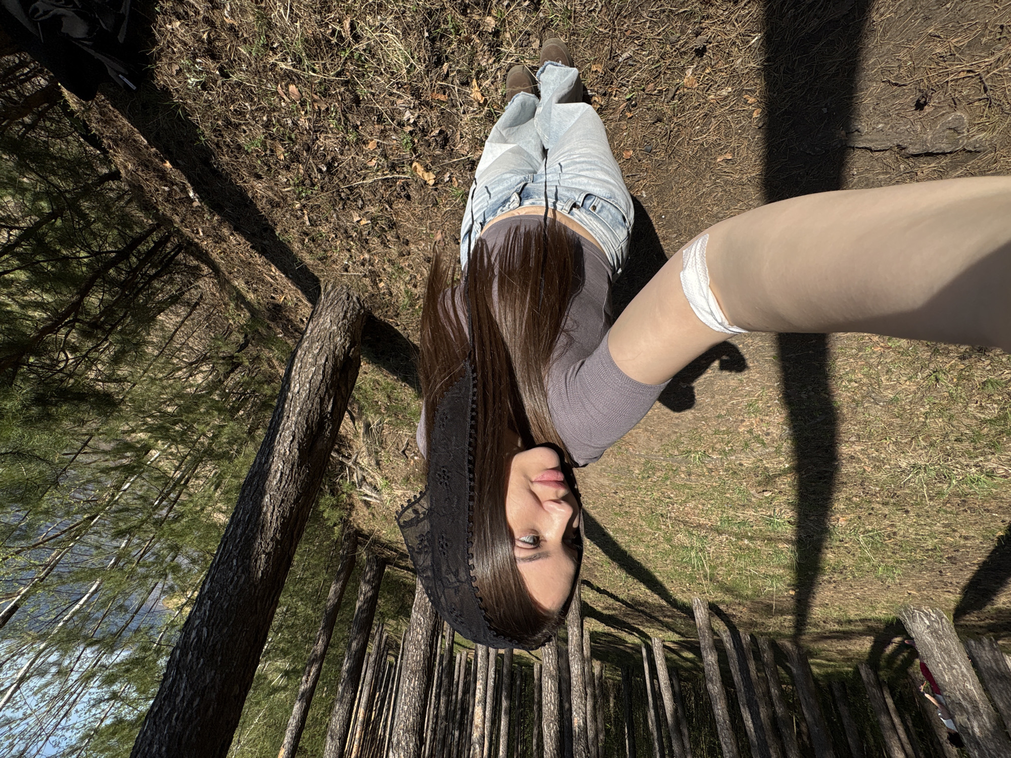 Woman Takes Early Morning Forest Selfies Near Water