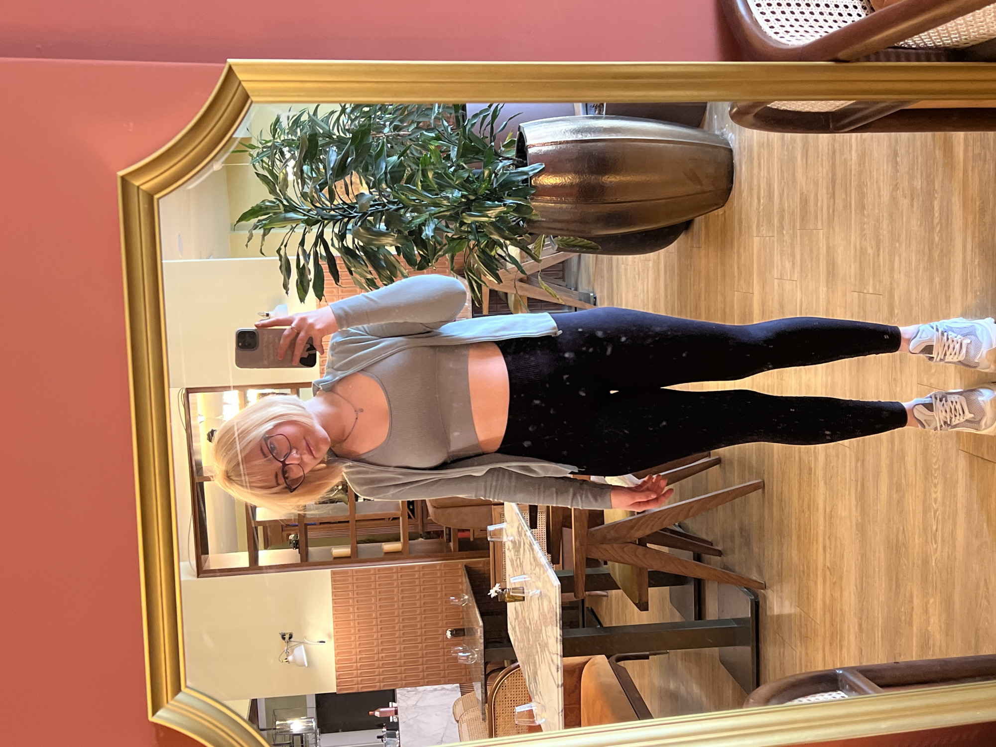 Woman takes mirror selfies with chihuahua at Montenegro cafe