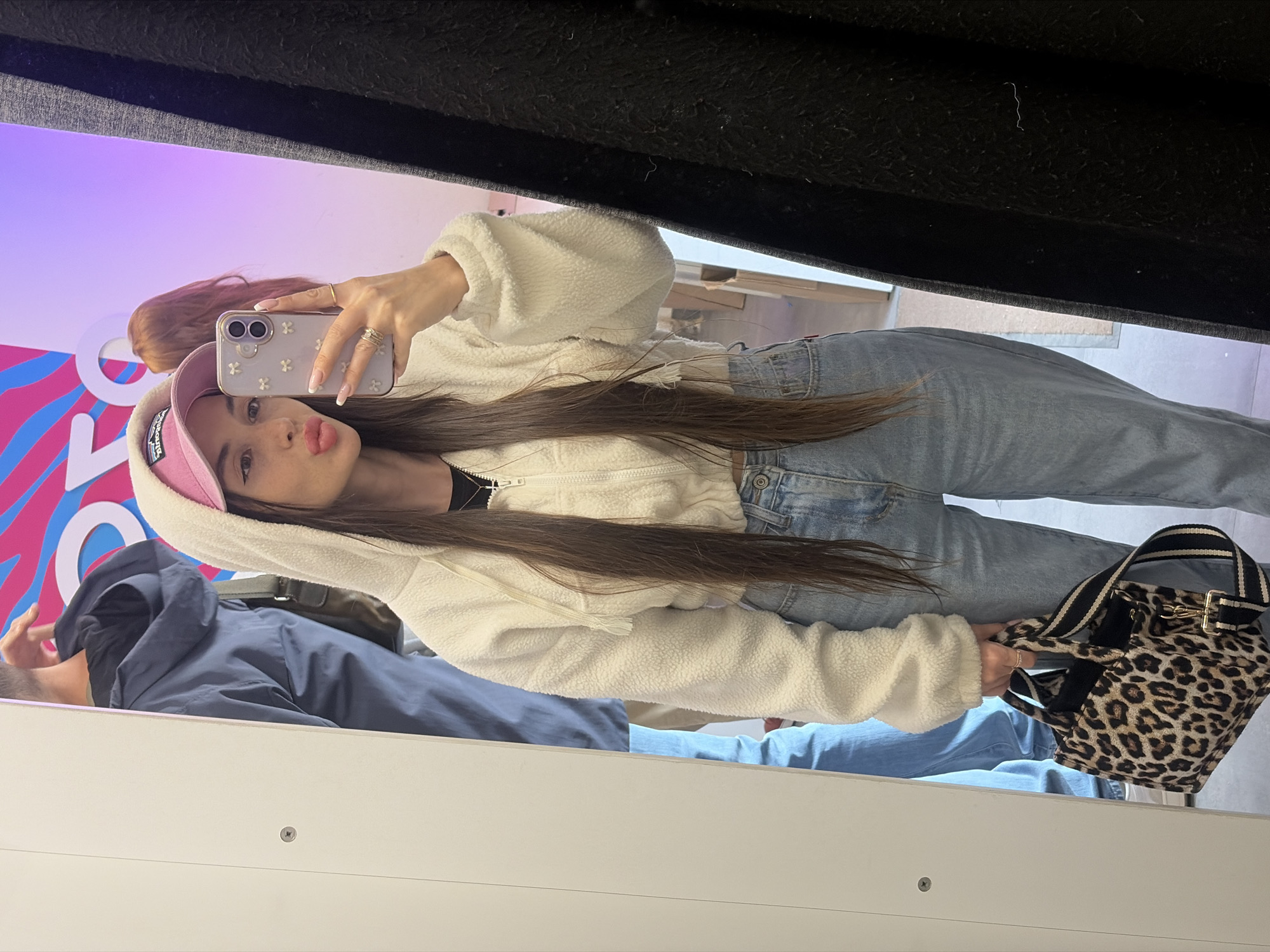 Woman takes selfies in Saint Petersburg fitting room