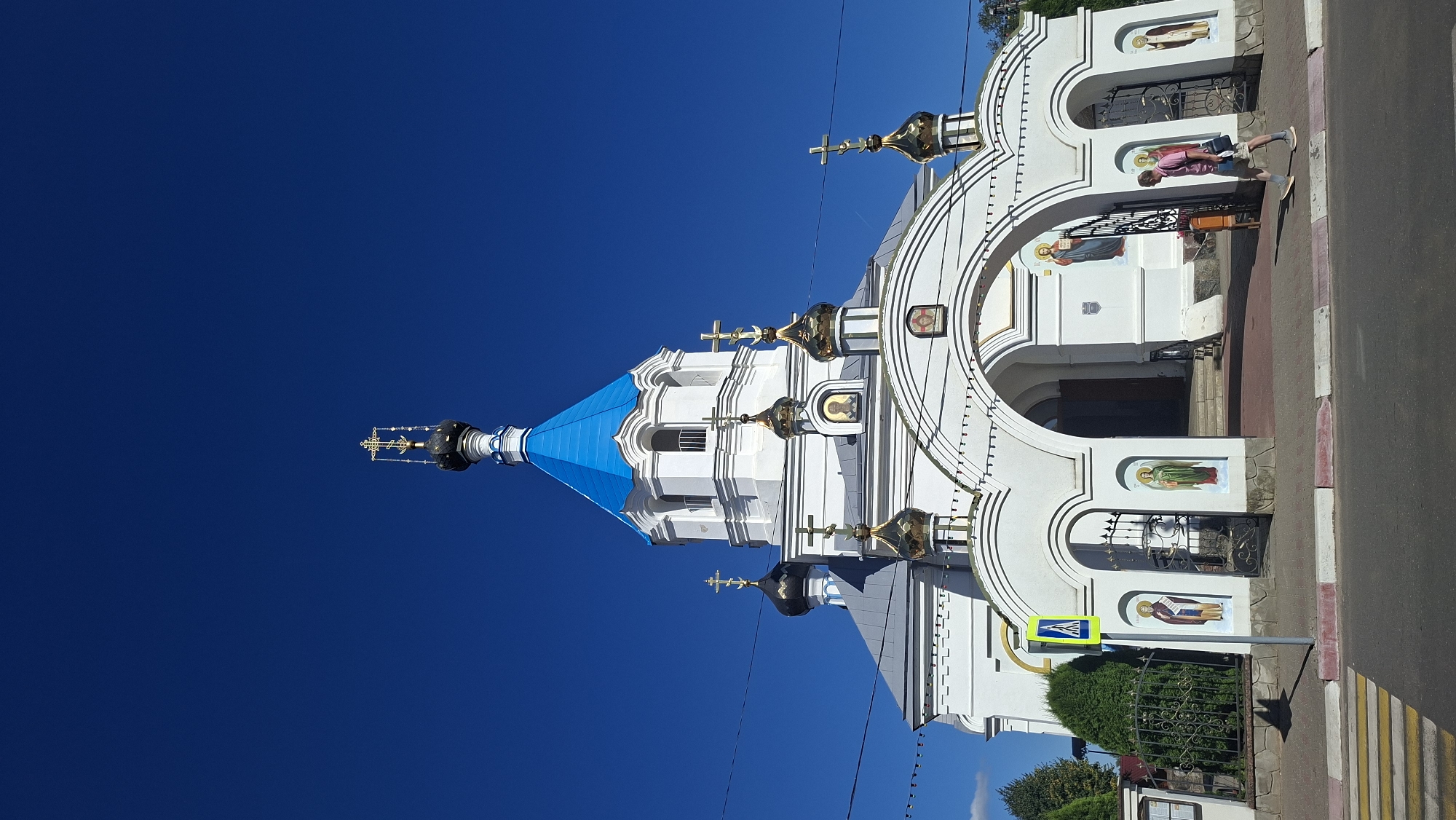 Sunny afternoon tour of Pastavy's churches, lake, and town landmarks