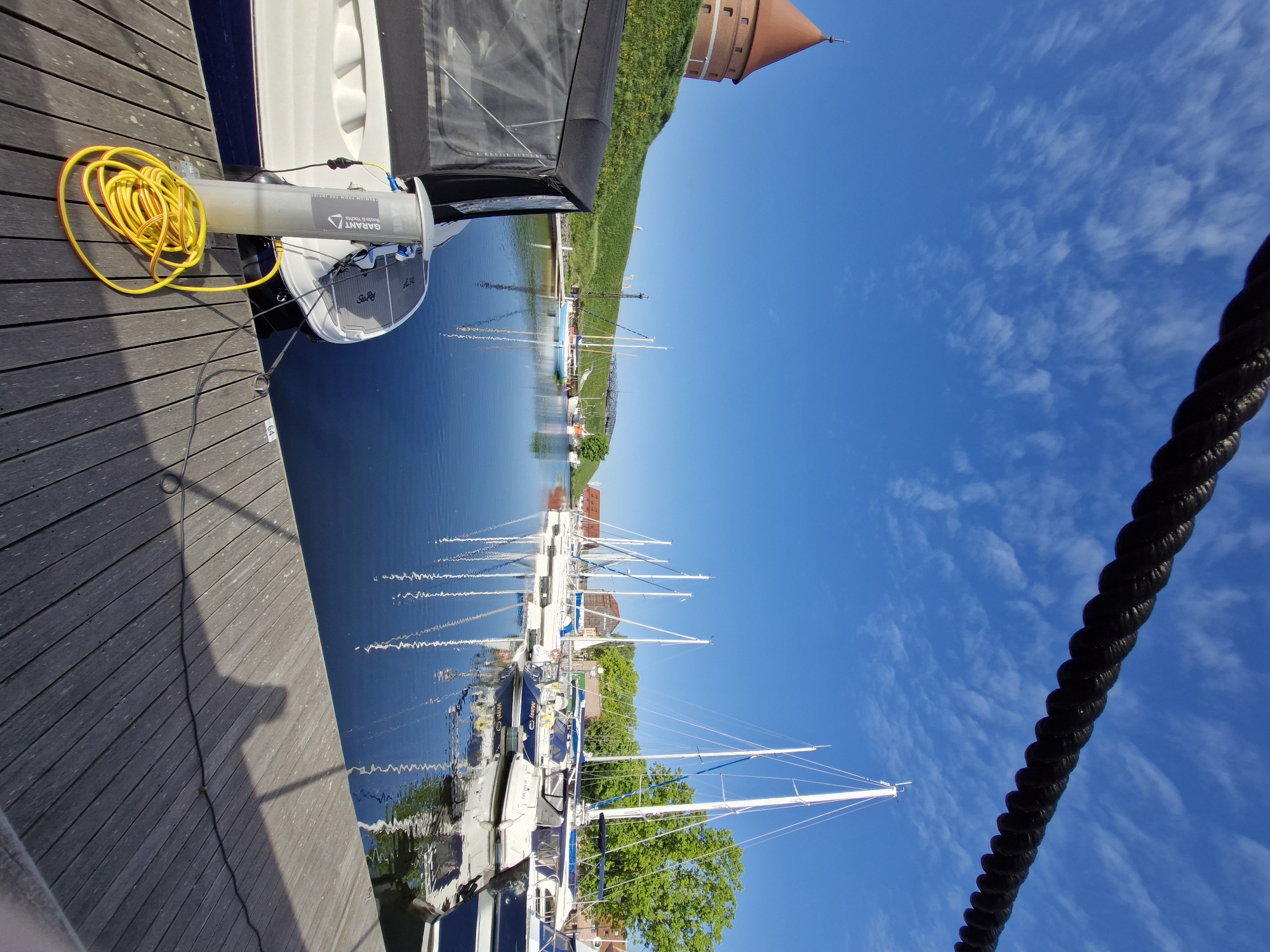Sunny morning scenes captured at Klaipėda marina and waterfront