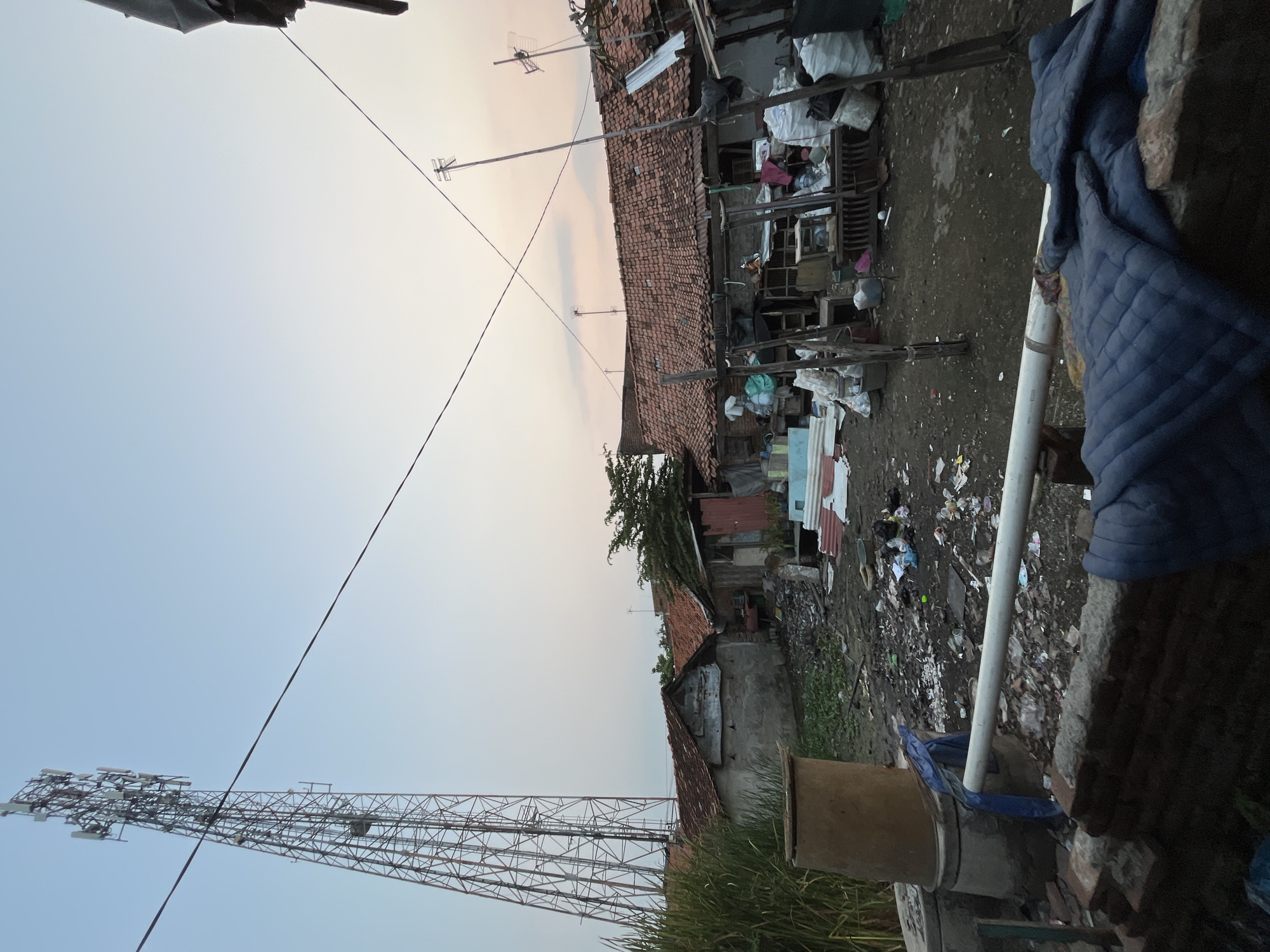 Telecom tower looms over cluttered backstreets in Pekalongan