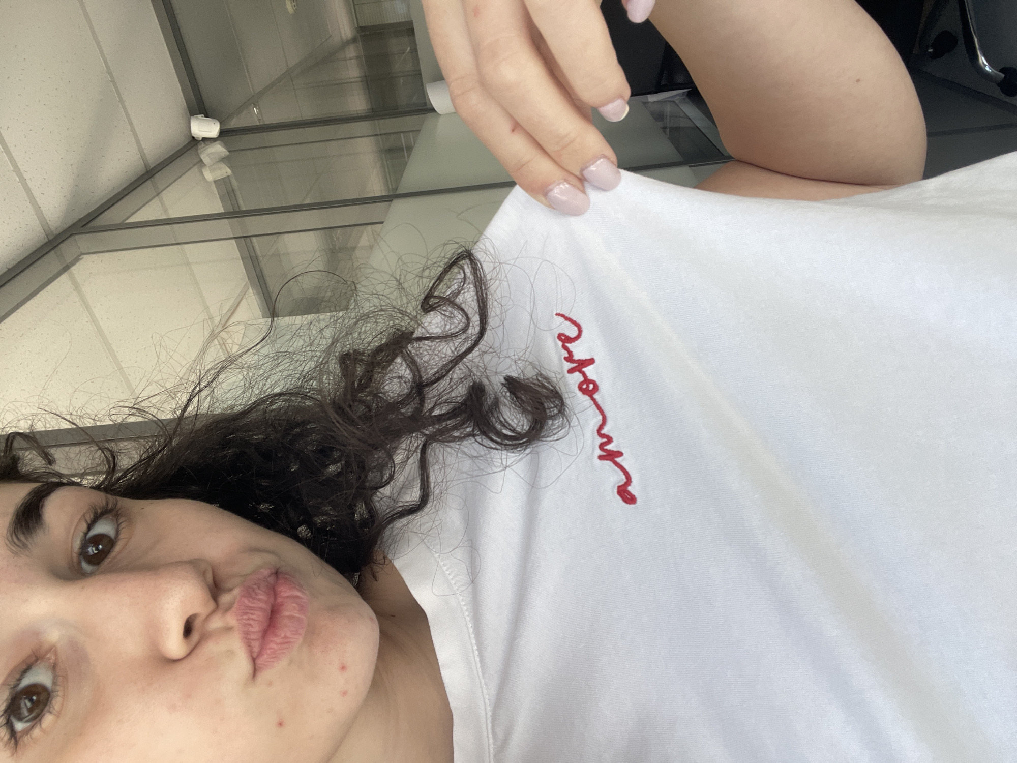 Woman takes selfies in Sofia wearing 'amore' shirt