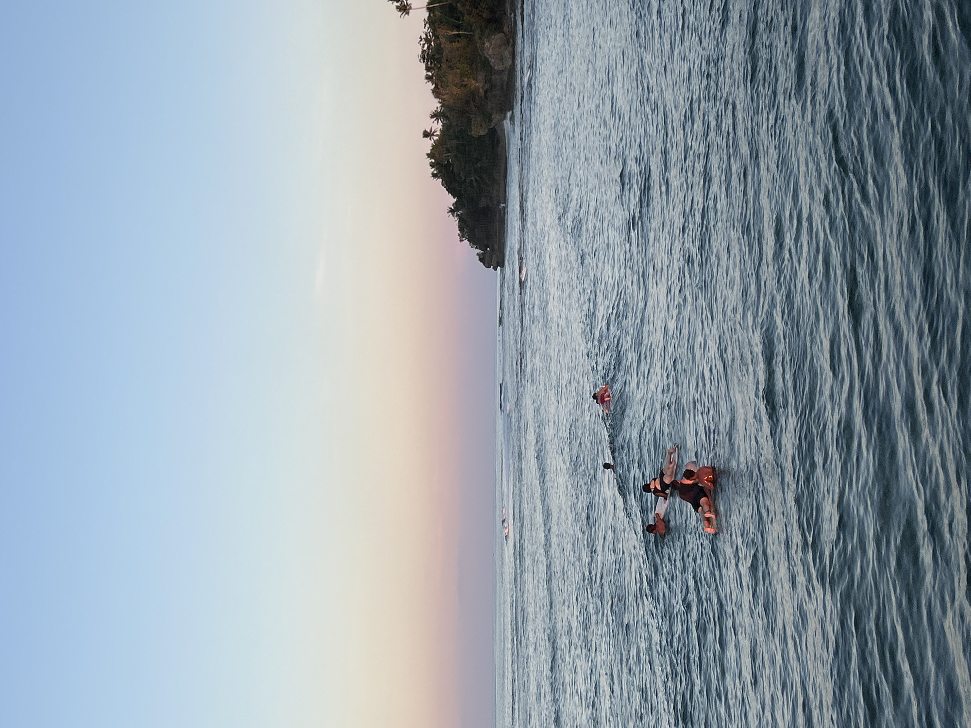 Sunset surfing session draws crowds to General Luna beaches