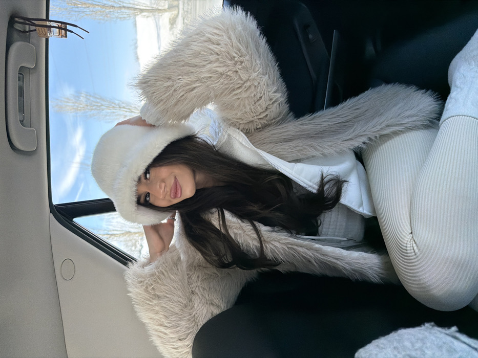 Woman travels through snowy Armenian countryside in winter