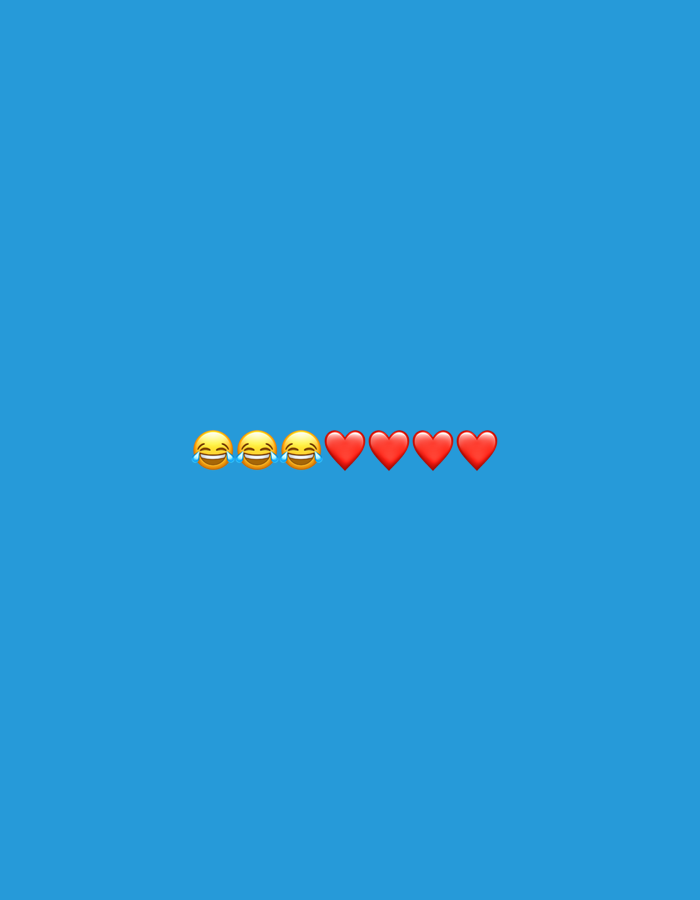Emoji display captured in Strasbourg showing hearts and laughter