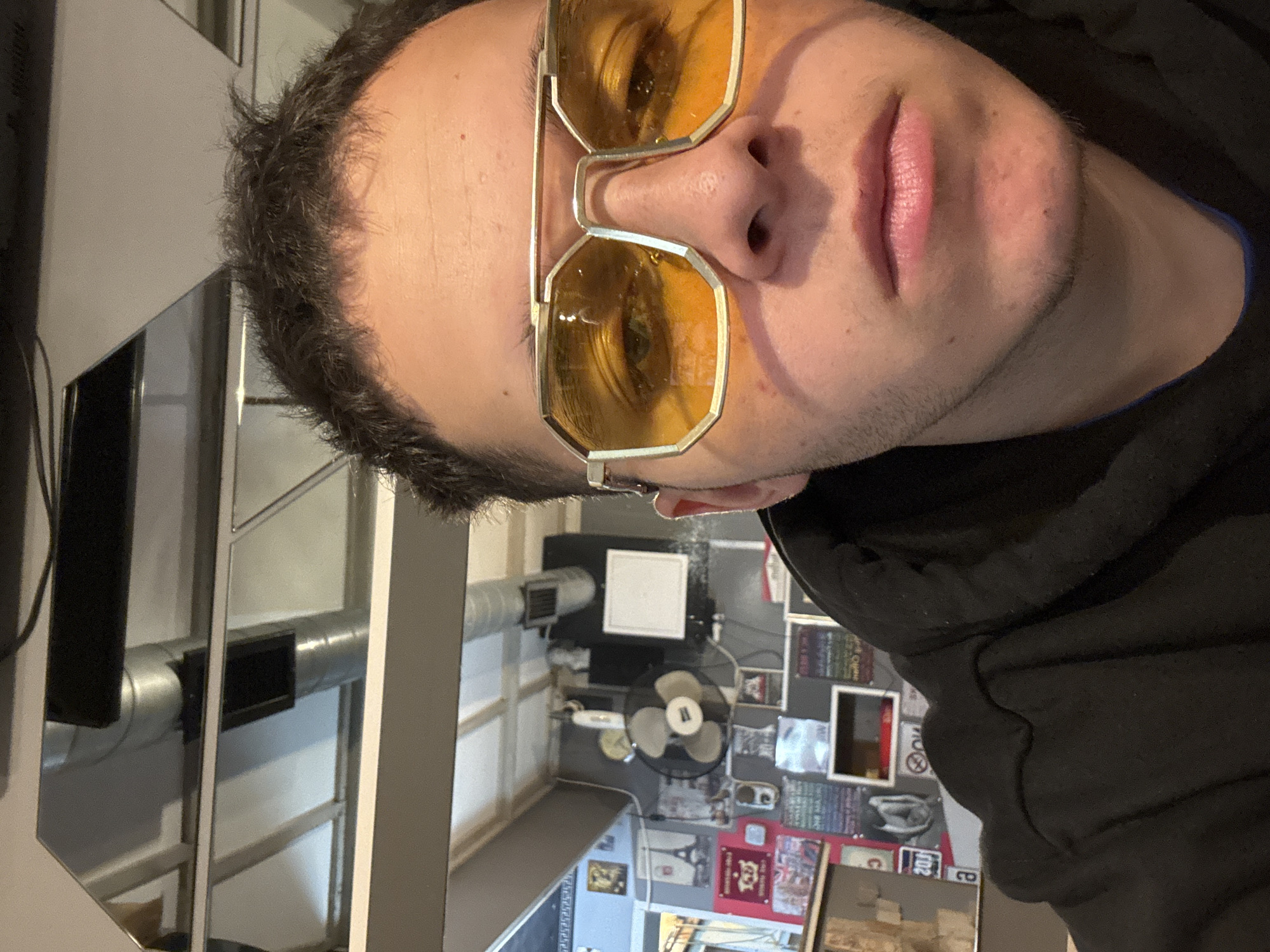 Man takes selfies indoors in Kostinbrod, Bulgaria