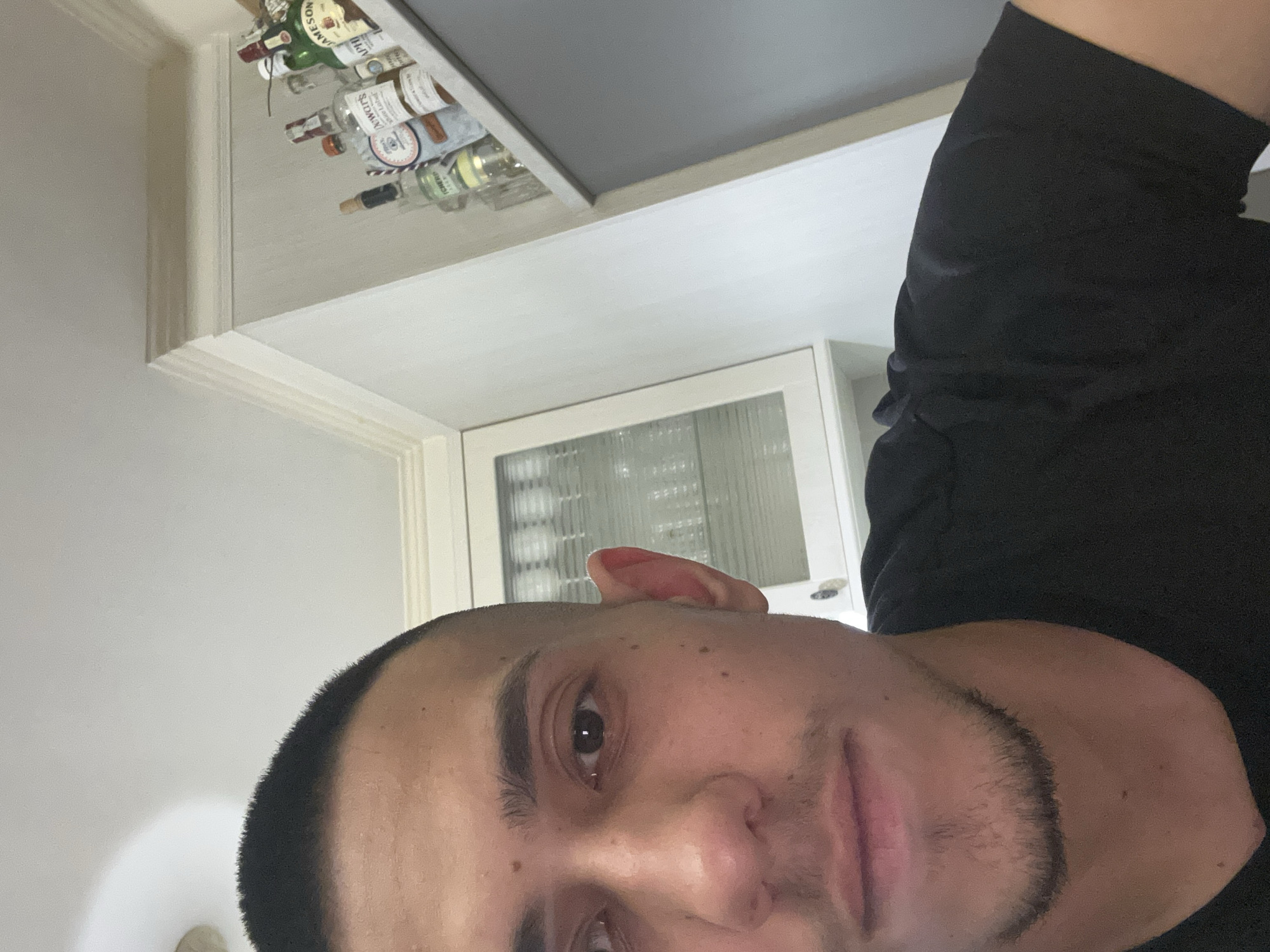 Young man takes indoor selfies in Plovdiv residence