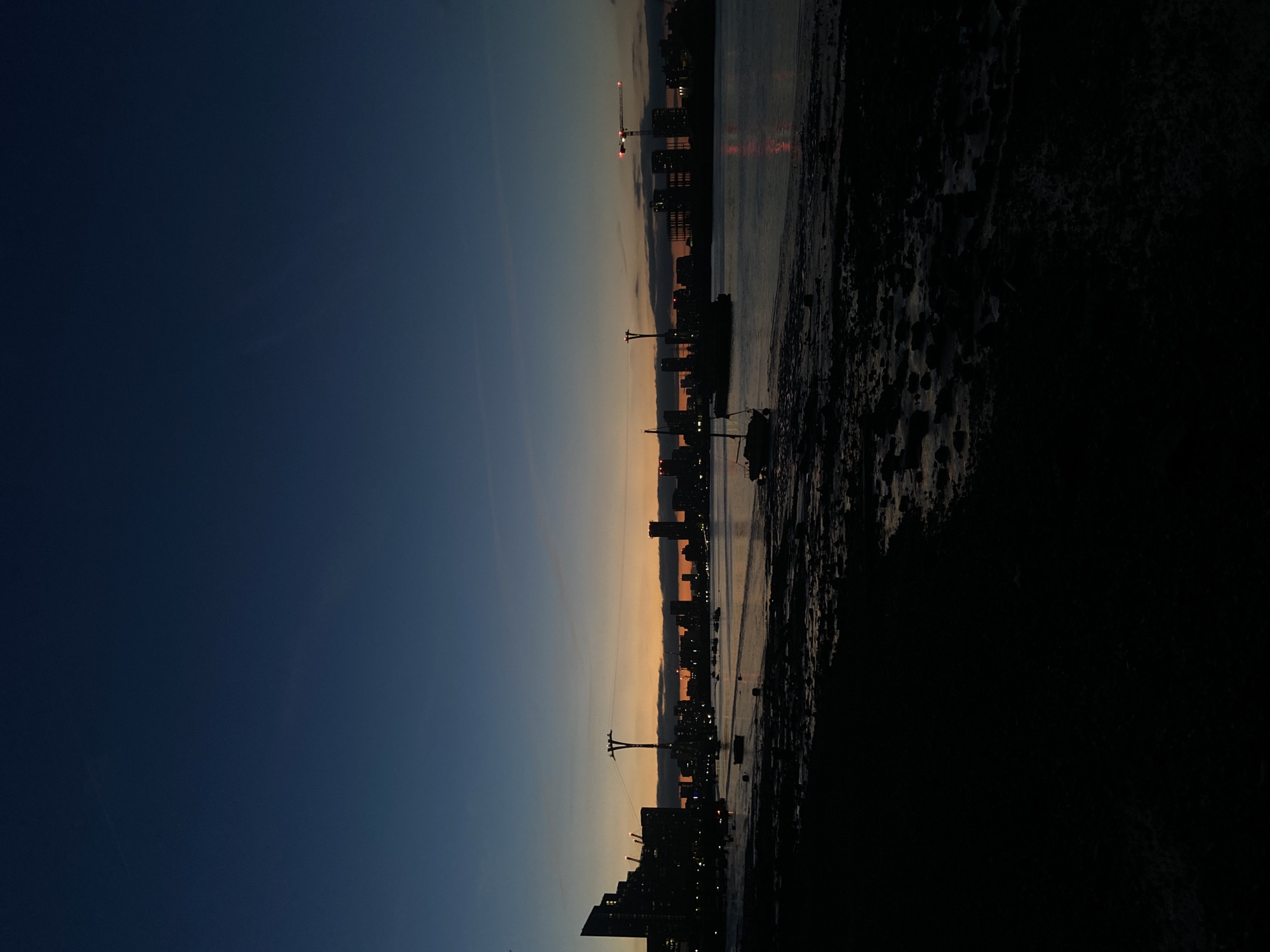London skyline at dusk, Thames-side as night falls