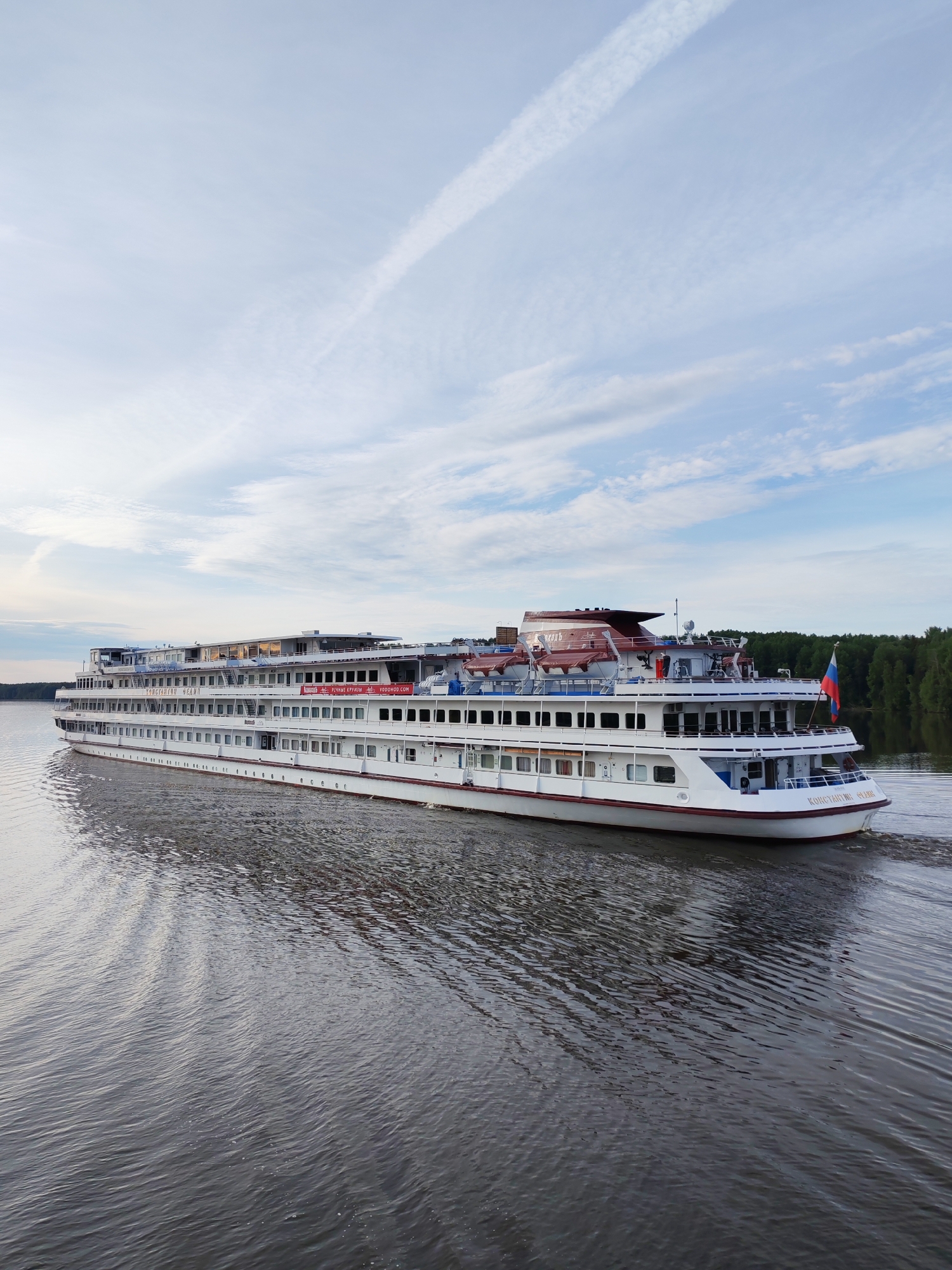 River cruise ship Konstantin Fedin sailing near Krapivino, Russia