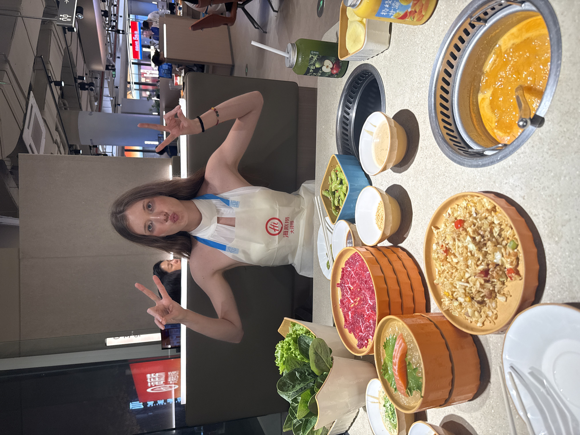 Woman documents seafood dining experience at Shanghai restaurant