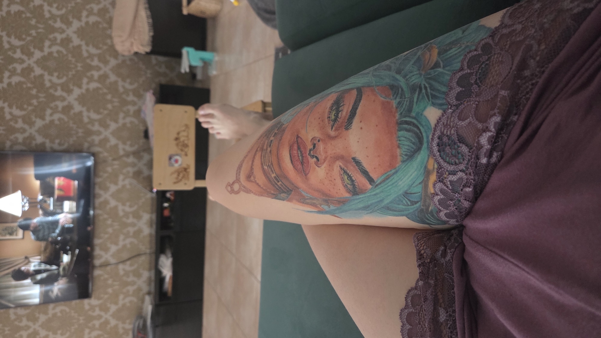 Person with green-haired woman tattoo spotted in Chaikovsky residence