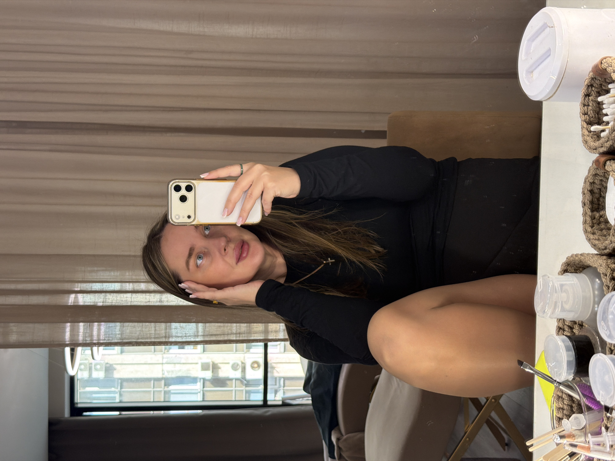 Woman takes selfies in Moscow beauty setting and elevator